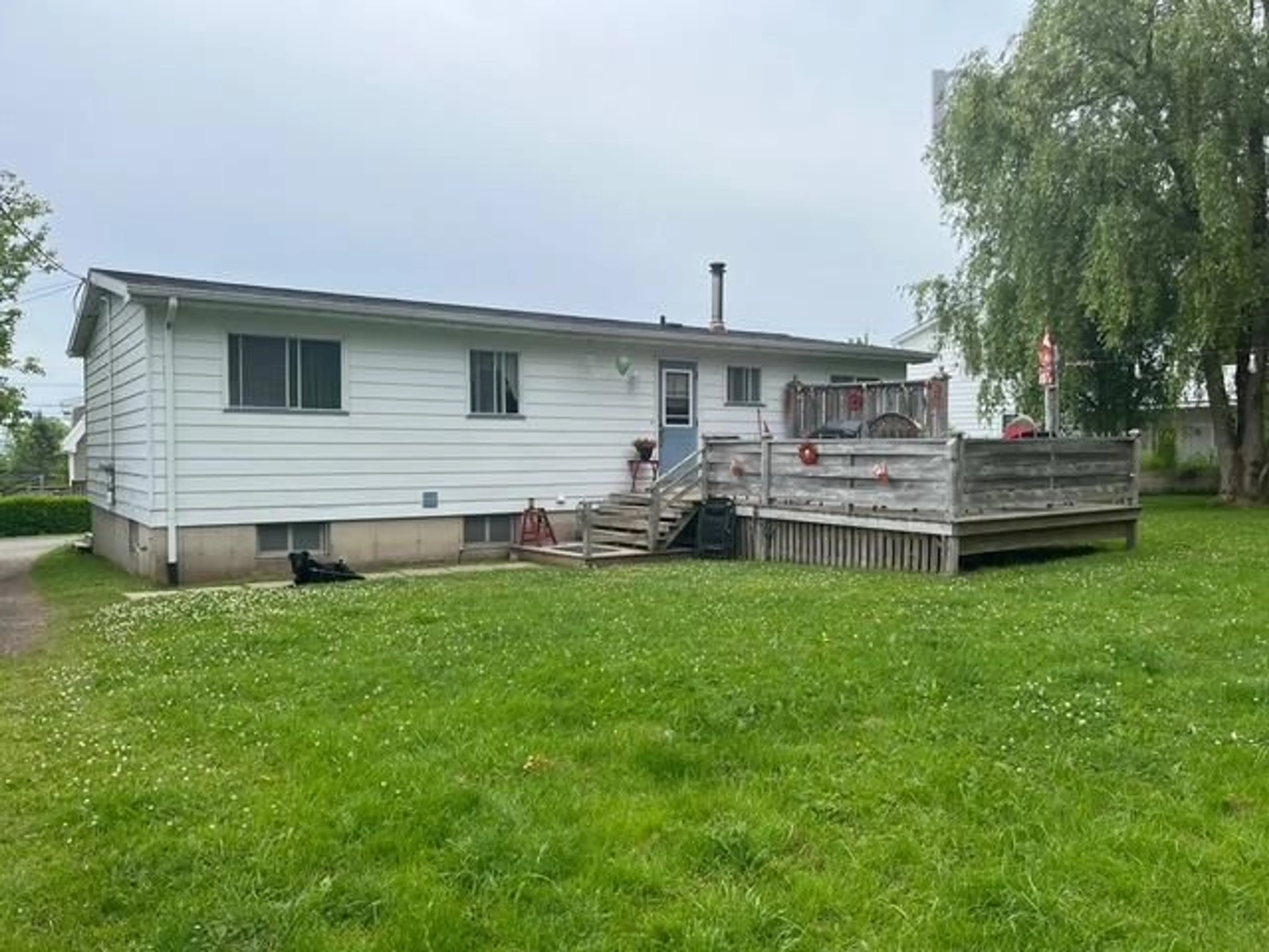 A pic from outside/outdoor area/front of a property/back of a property/a pic from drone, unknown for 82 High St, Baddeck Nova Scotia B0E 1B0