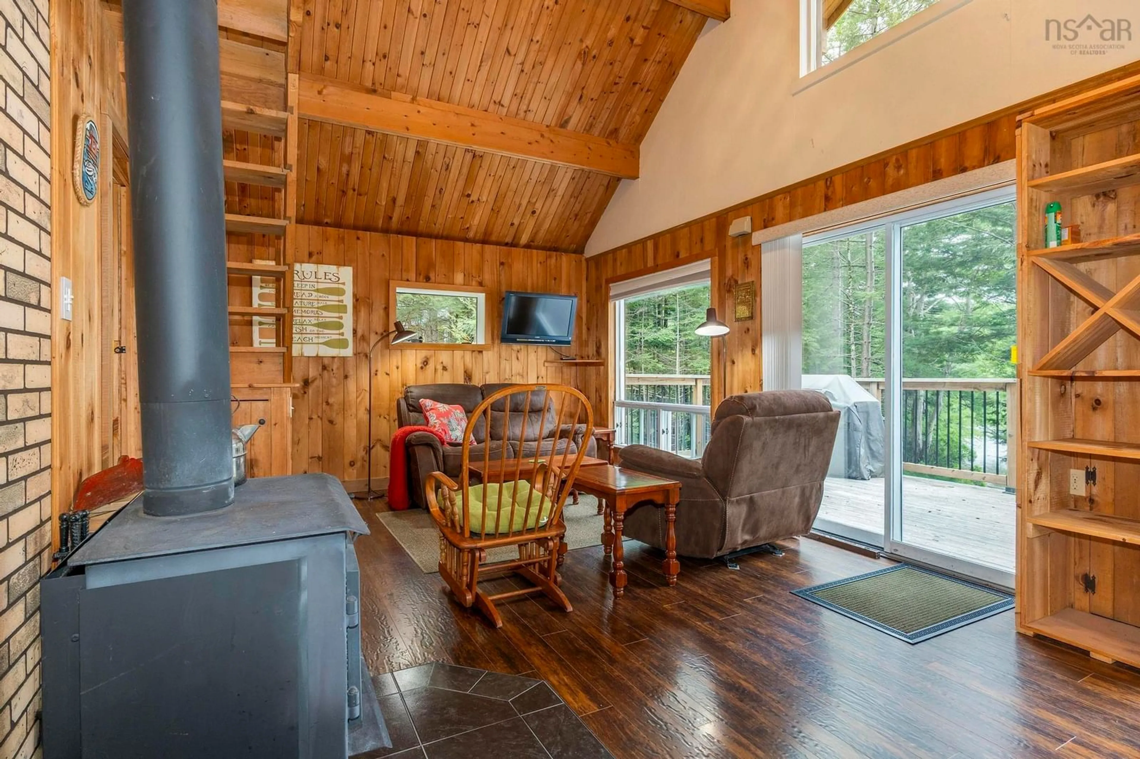 Living room with furniture, wood/laminate floor for 170 Tri Lake Dr, Labelle Nova Scotia B0T 1E0