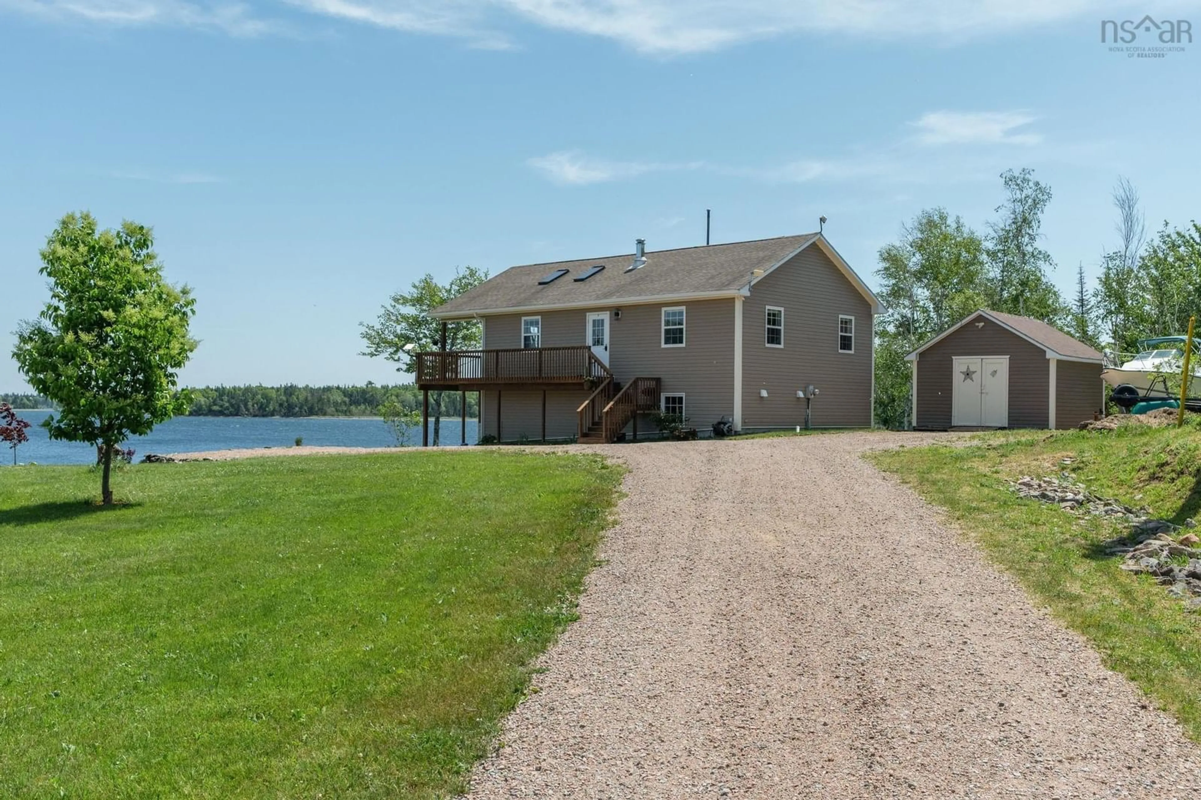 A pic from outside/outdoor area/front of a property/back of a property/a pic from drone, water/lake/river/ocean view for 1280 Big Harbour Island Rd, River Denys Nova Scotia B0E 2Y0