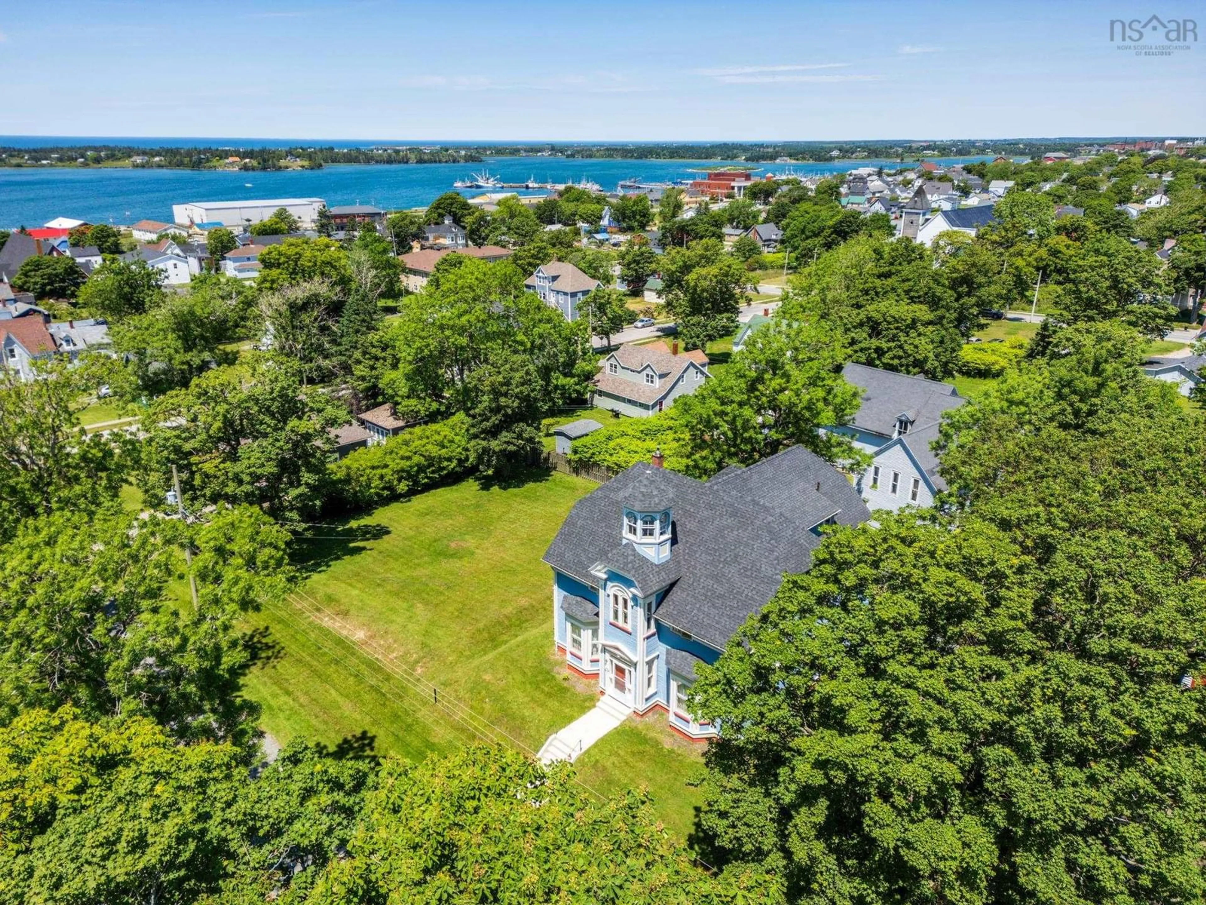 A pic from outside/outdoor area/front of a property/back of a property/a pic from drone, water/lake/river/ocean view for 42 Queen St, Yarmouth Nova Scotia B5A 3Y5