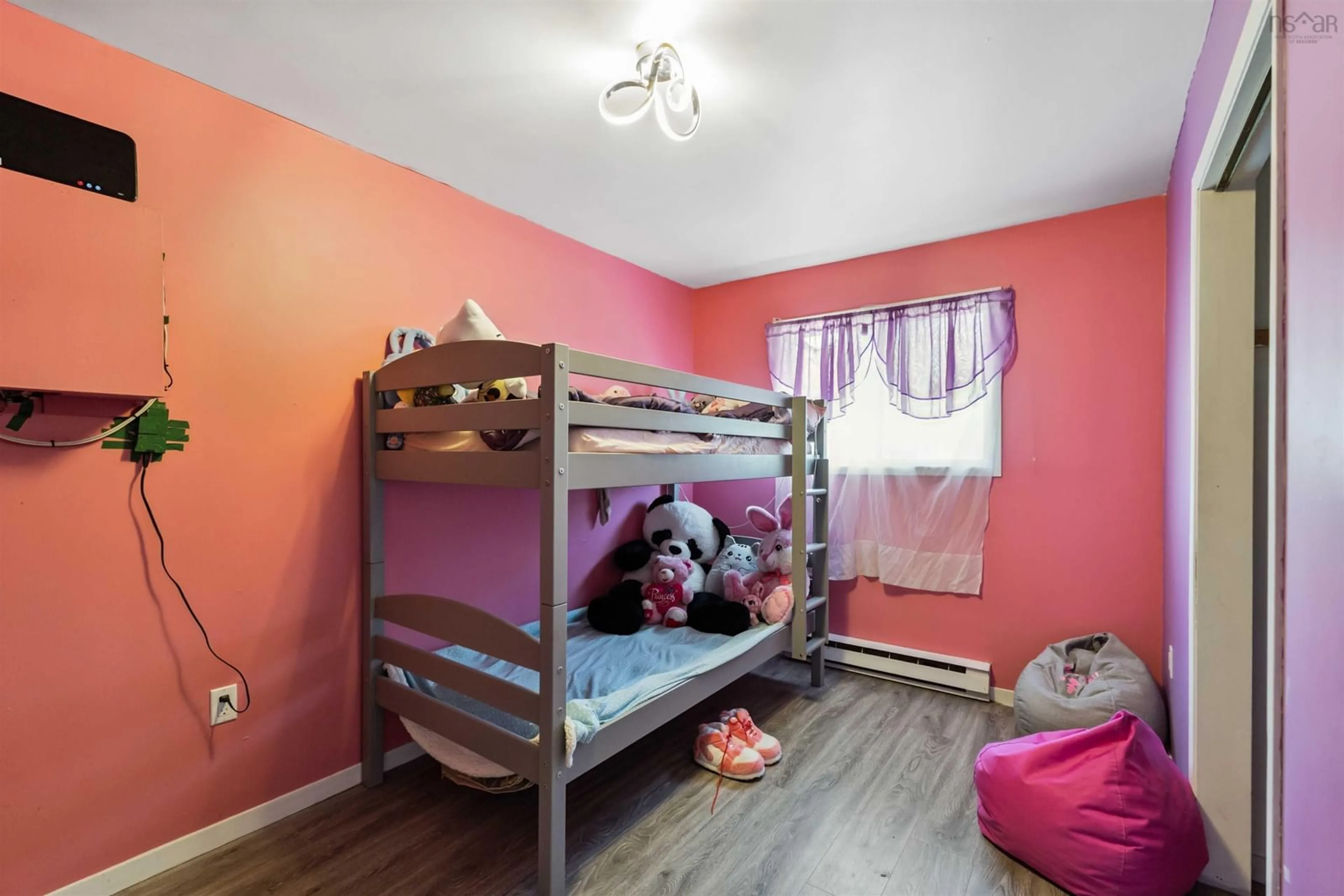 Bedroom with bed, wood/laminate floor for 4632 Highway 1, Three Mile Plains Nova Scotia B0N 2T0