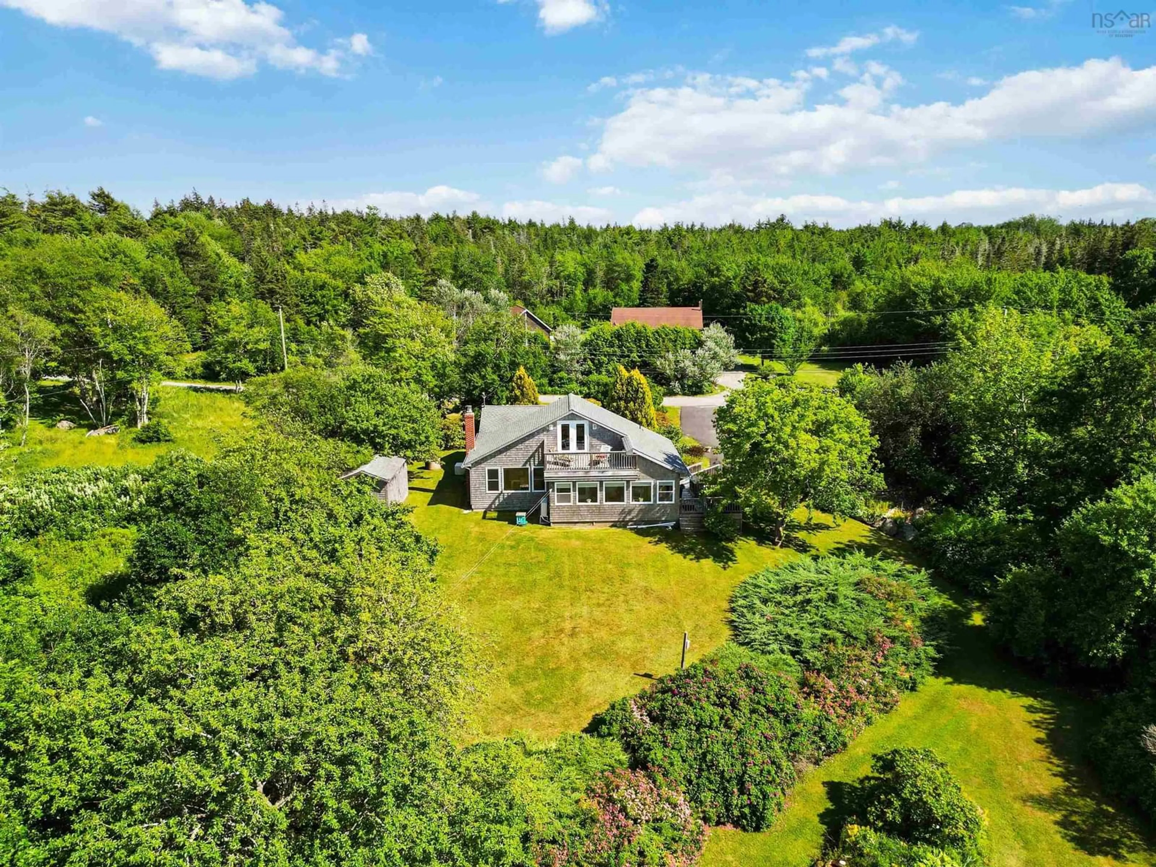 A pic from outside/outdoor area/front of a property/back of a property/a pic from drone, forest/trees view for 78 Fostertown Rd, Port Medway Nova Scotia B0J 2T0