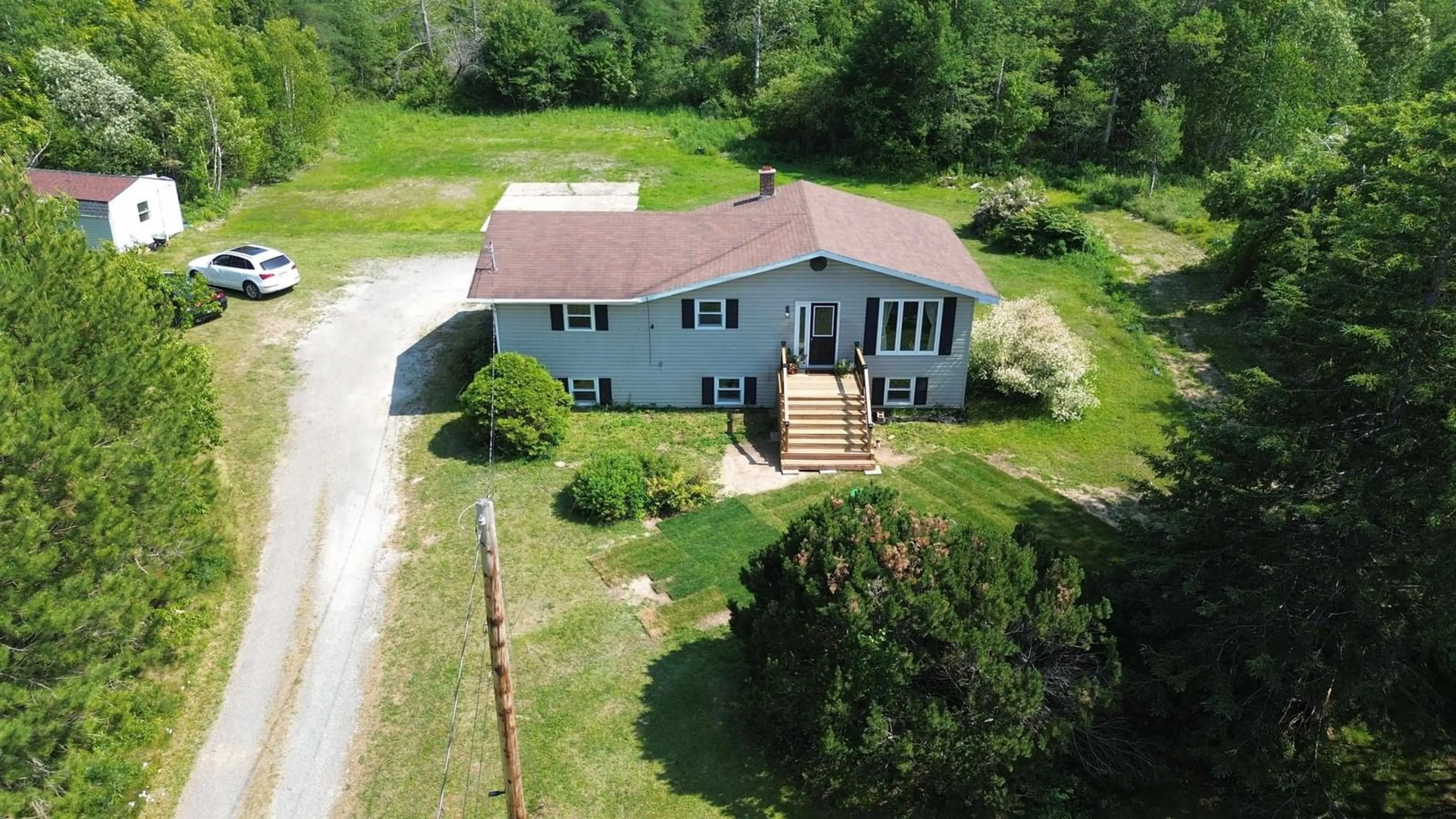A pic from outside/outdoor area/front of a property/back of a property/a pic from drone, water/lake/river/ocean view for 173 O'brien St, Gardiner Mines Nova Scotia B1H 5N7