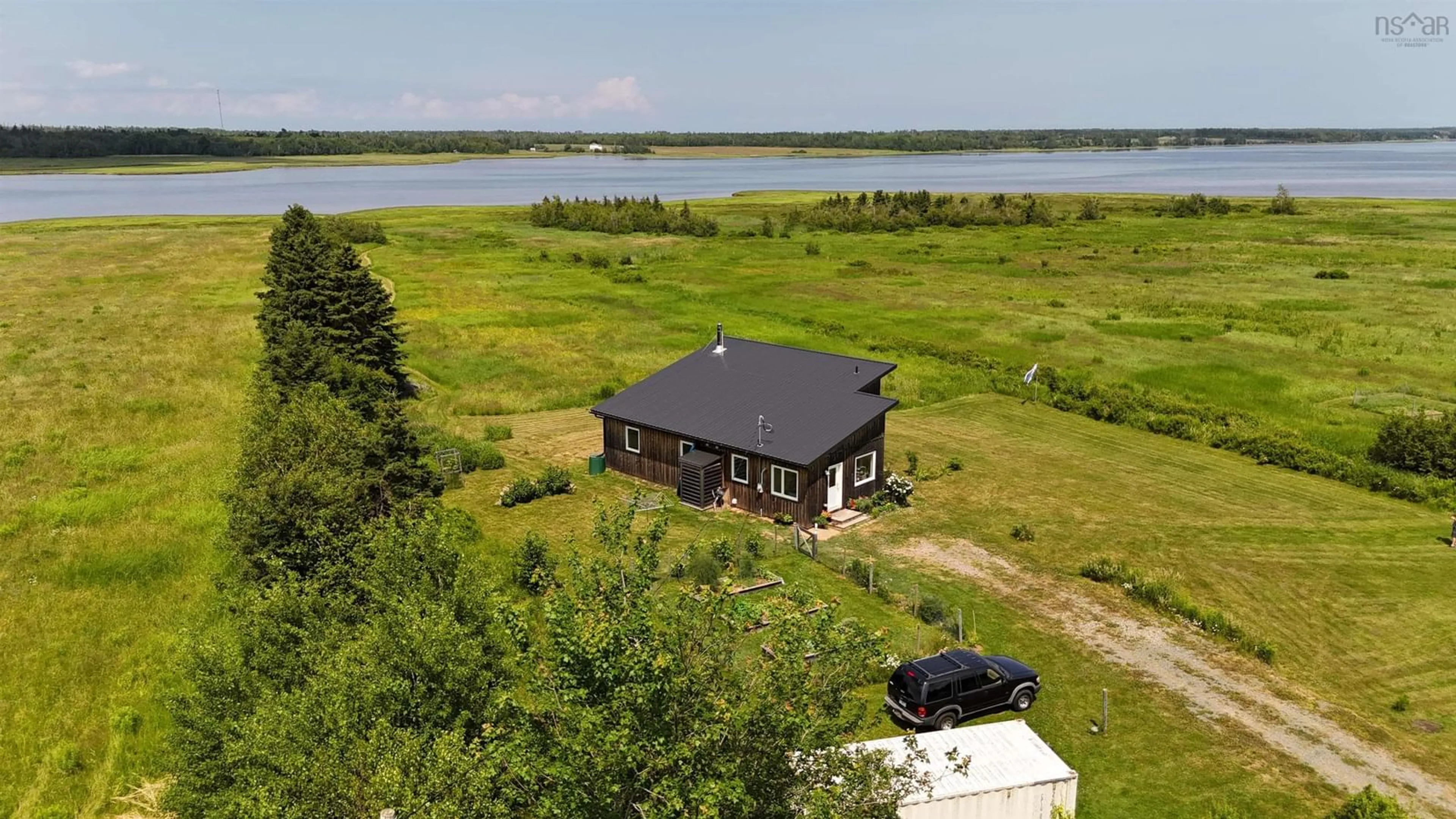 A pic from outside/outdoor area/front of a property/back of a property/a pic from drone, water/lake/river/ocean view for 93 Fox Harbour South Rd, North Wallace Nova Scotia B0K 1Y0