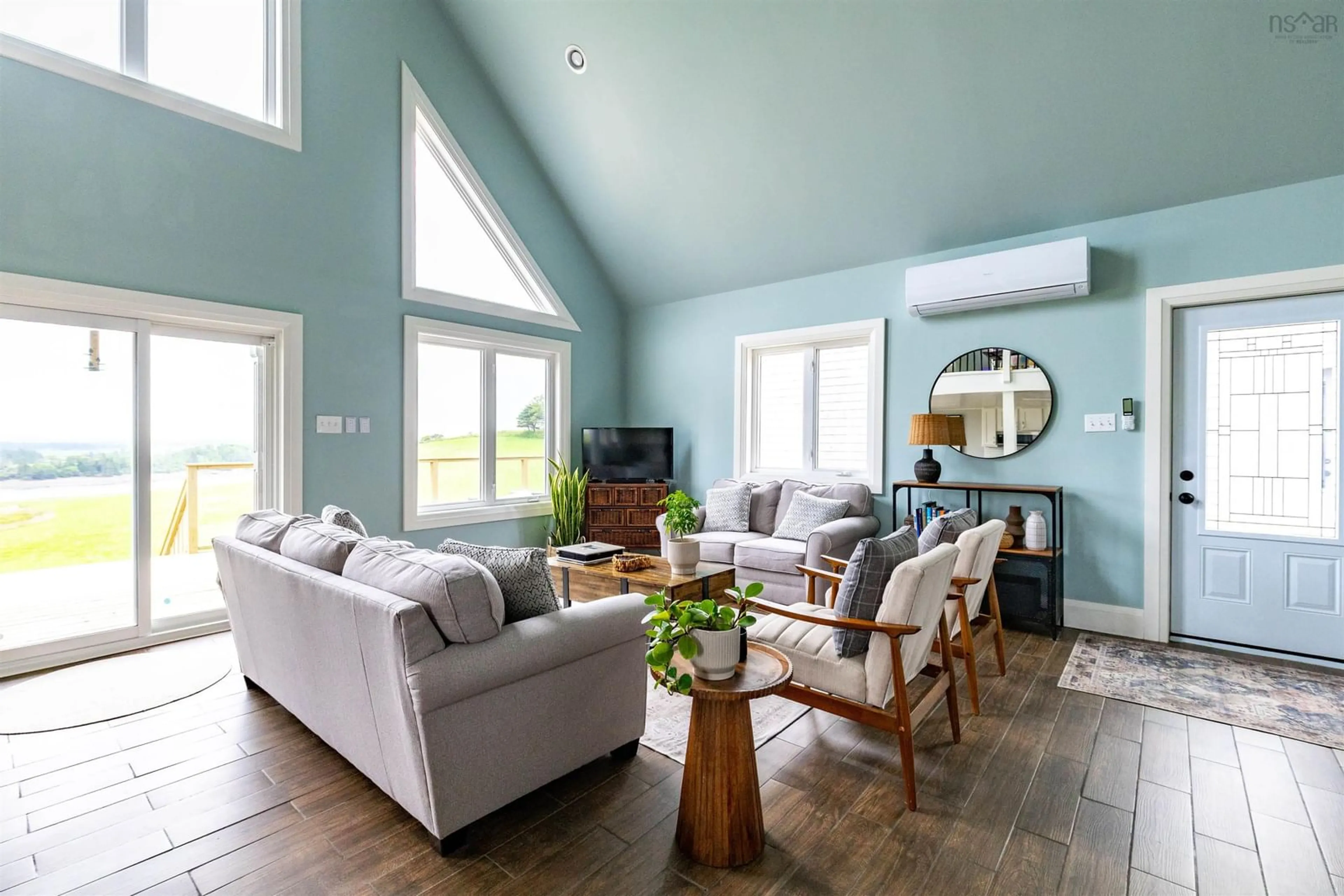 Living room with furniture, wood/laminate floor for 543 Chebogue Rd, Central Chebogue Nova Scotia B5A 5G1
