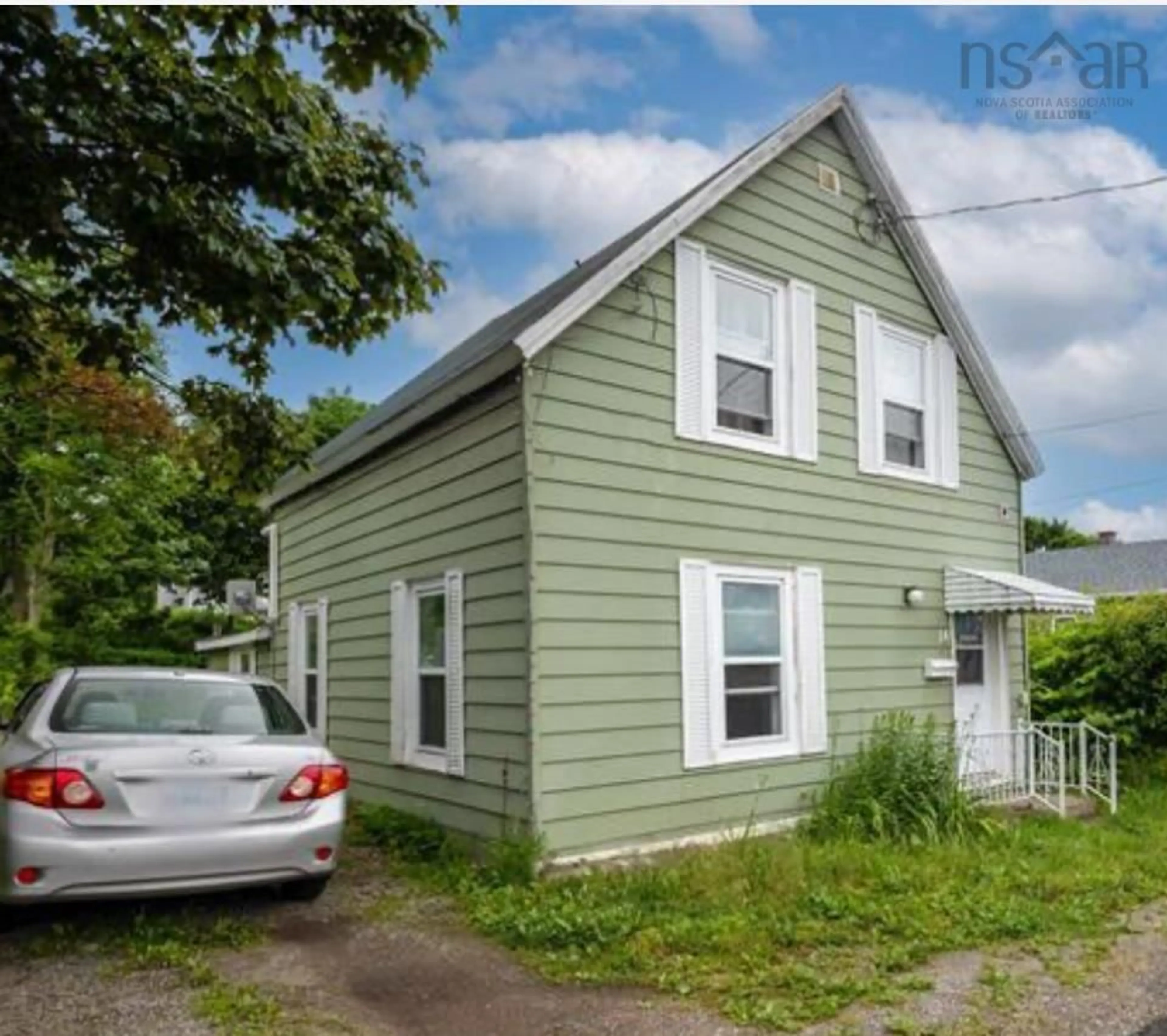 Home with vinyl exterior material, street for 14 Mcdougall St, Glace Bay Nova Scotia B1A 3E7