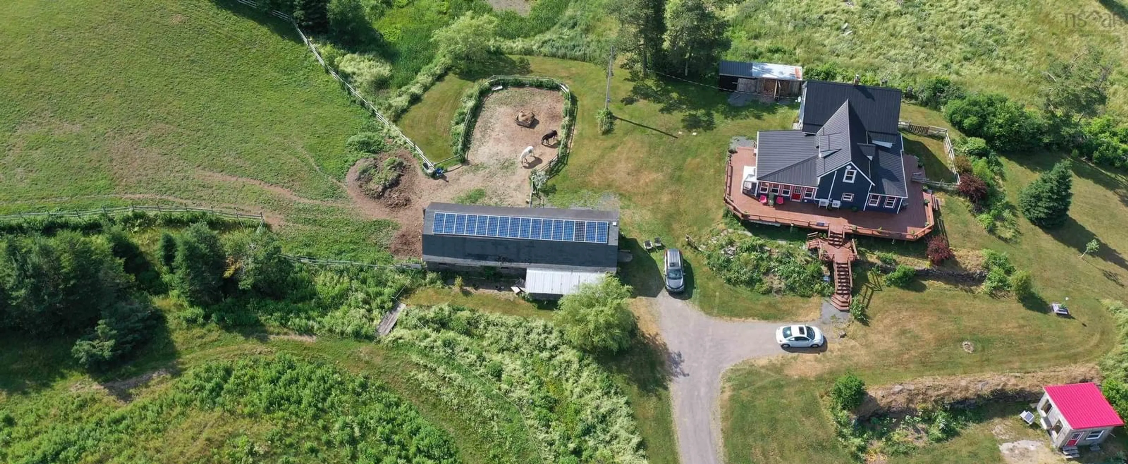 A pic from outside/outdoor area/front of a property/back of a property/a pic from drone, building for 3925 East River West Side Rd, Bridgeville Nova Scotia B0K 1B0