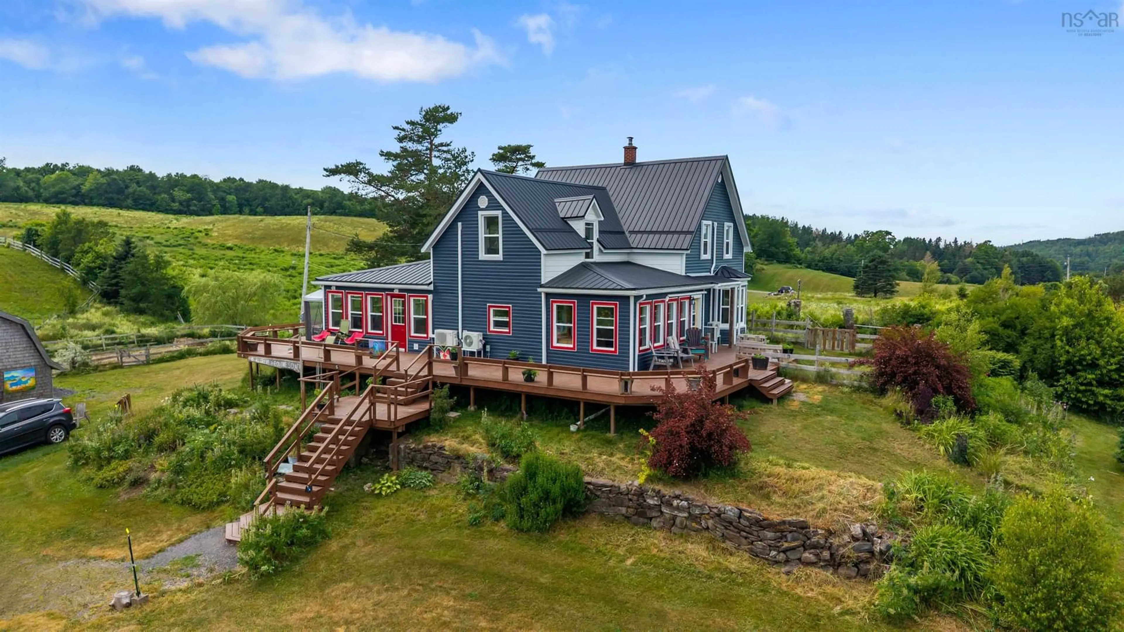 A pic from outside/outdoor area/front of a property/back of a property/a pic from drone, water/lake/river/ocean view for 3925 East River West Side Rd, Bridgeville Nova Scotia B0K 1B0