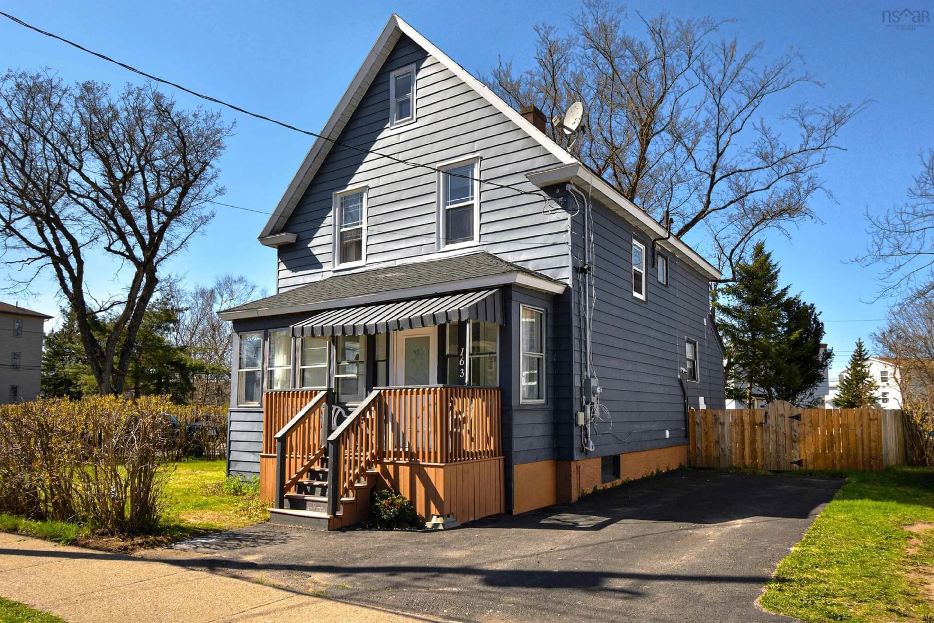 Home with vinyl exterior material, street for 163 Brookland St, Sydney Nova Scotia B1P 5B7