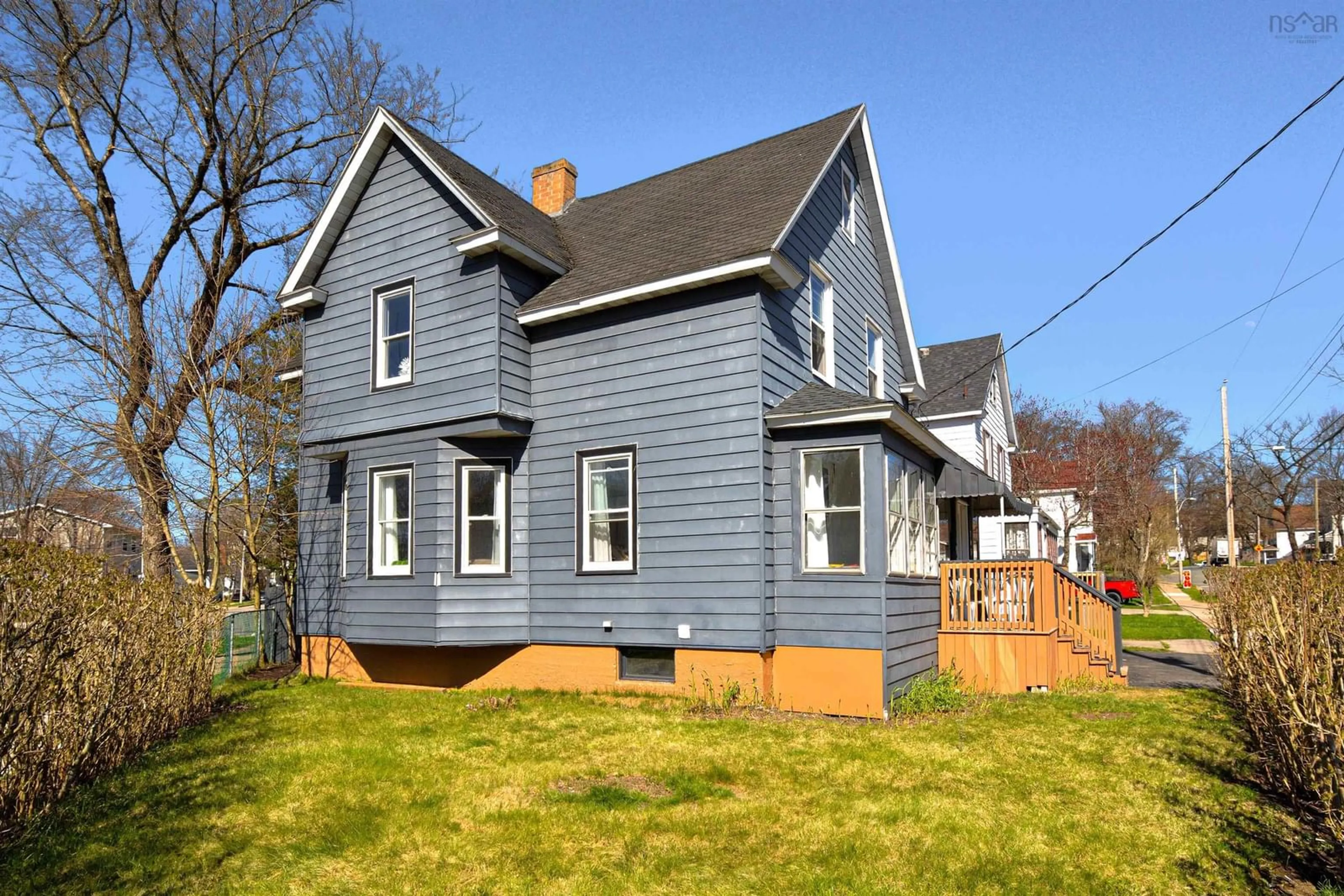 Home with vinyl exterior material, street for 163 Brookland St, Sydney Nova Scotia B1P 5B7