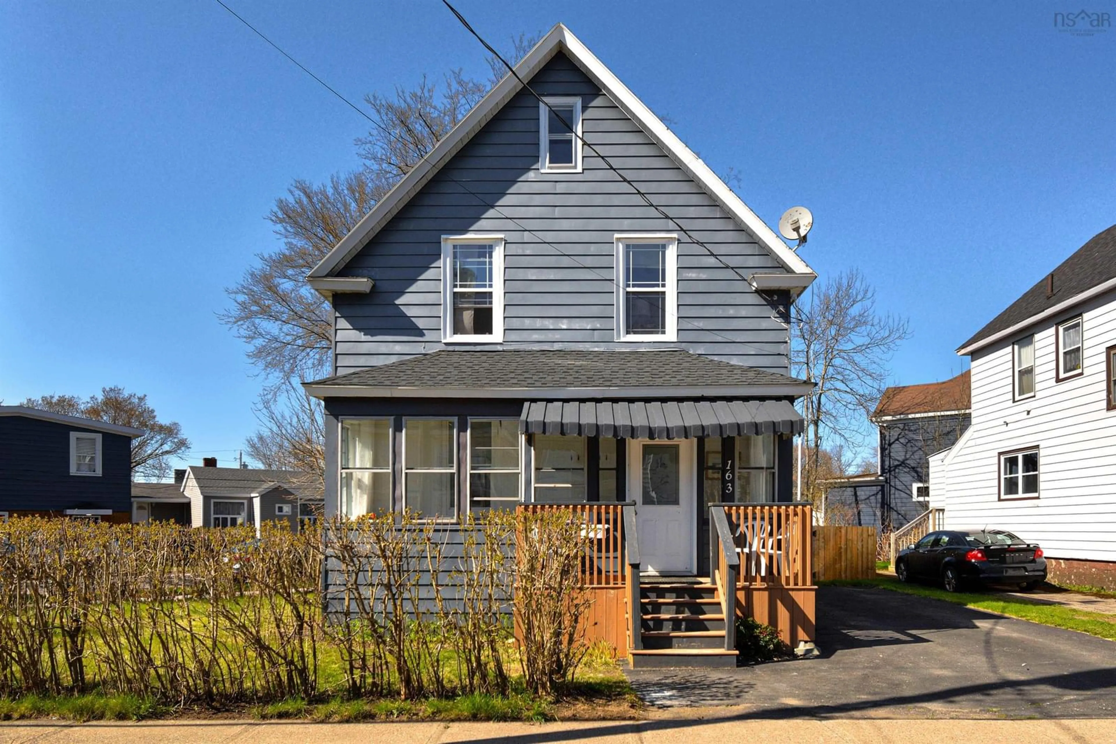 Home with vinyl exterior material, street for 163 Brookland St, Sydney Nova Scotia B1P 5B7