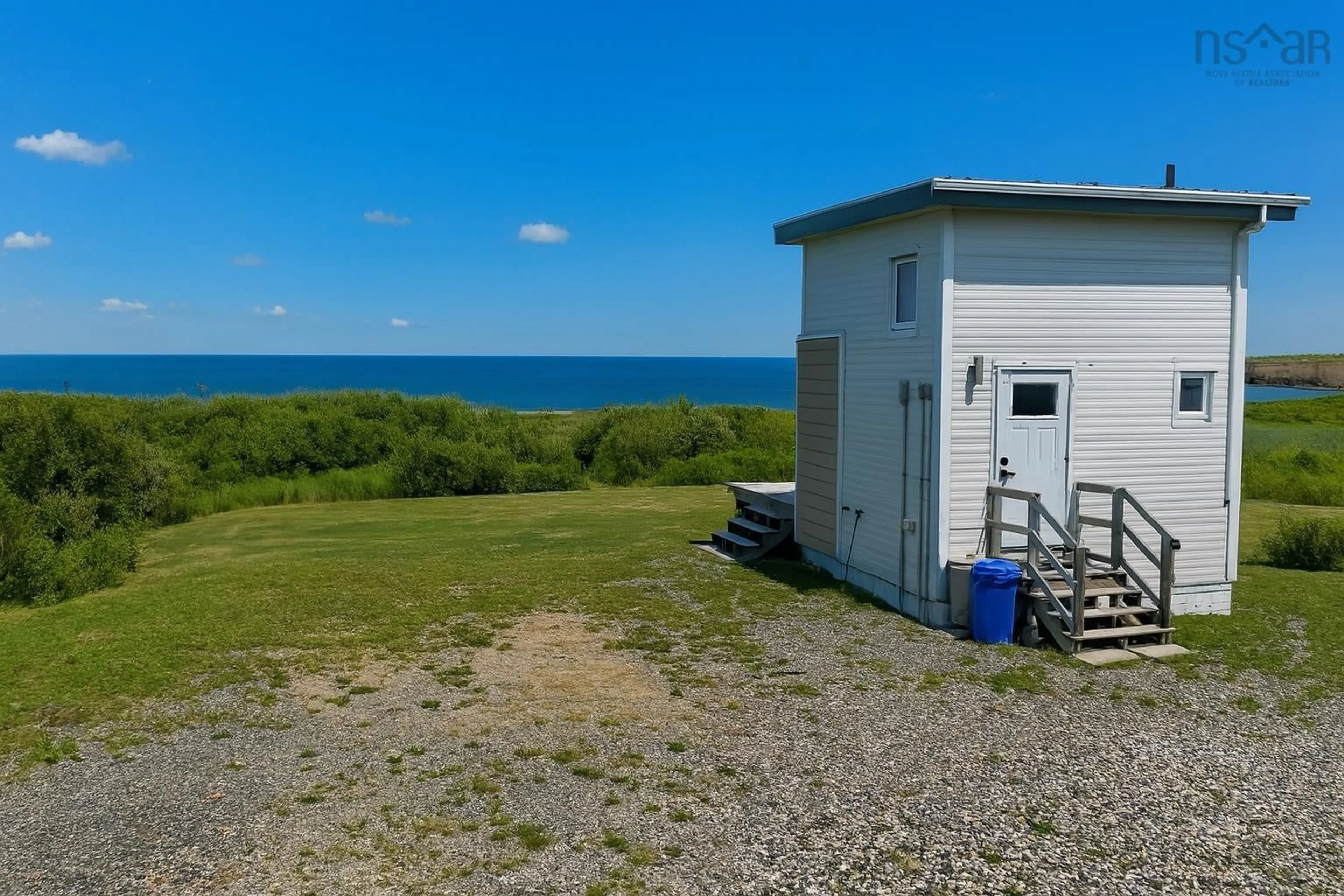 A pic from outside/outdoor area/front of a property/back of a property/a pic from drone, water/lake/river/ocean view for 132 Ocean Ave, Dominion Nova Scotia B1G 1R3