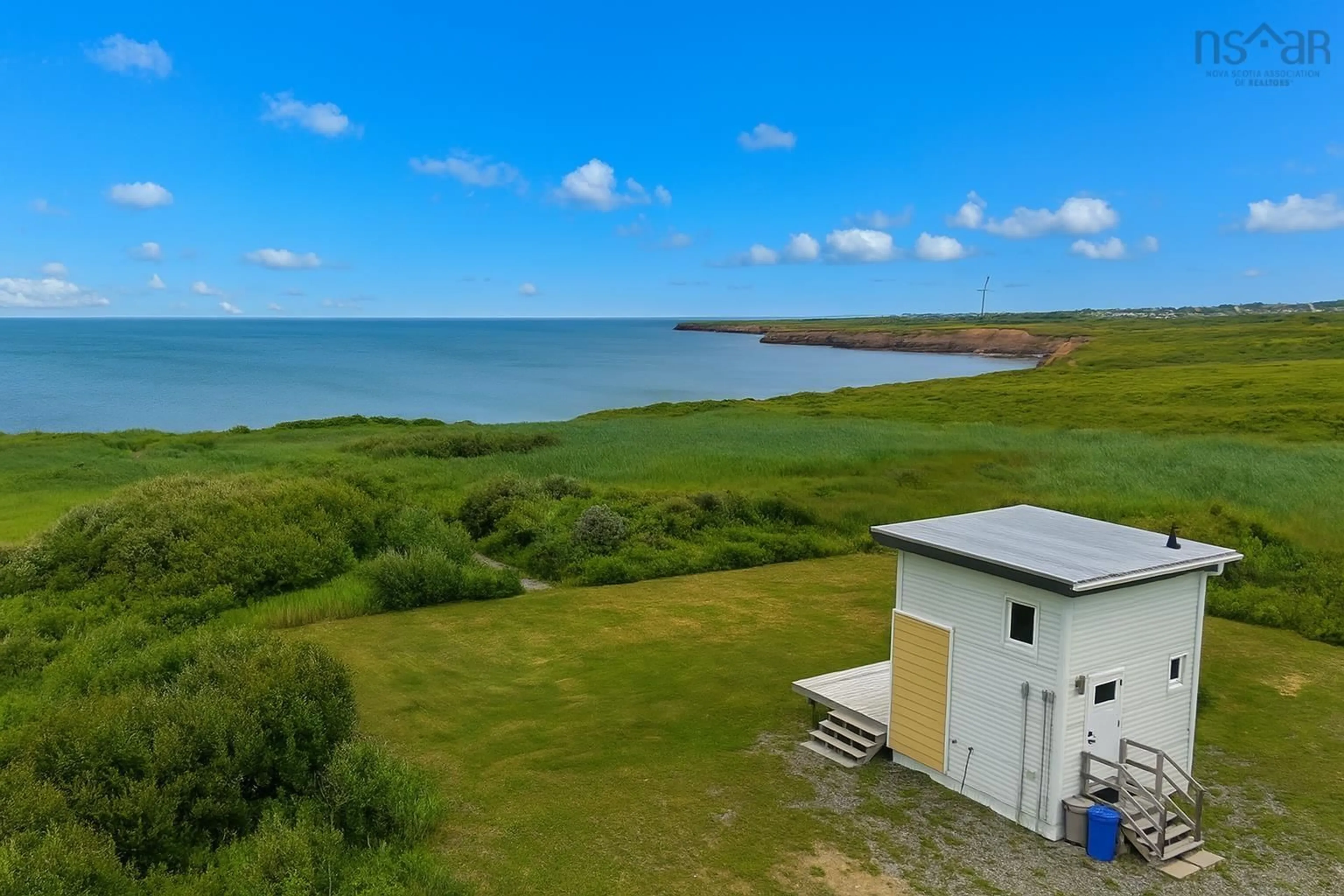 A pic from outside/outdoor area/front of a property/back of a property/a pic from drone, water/lake/river/ocean view for 132 Ocean Ave, Dominion Nova Scotia B1G 1R3