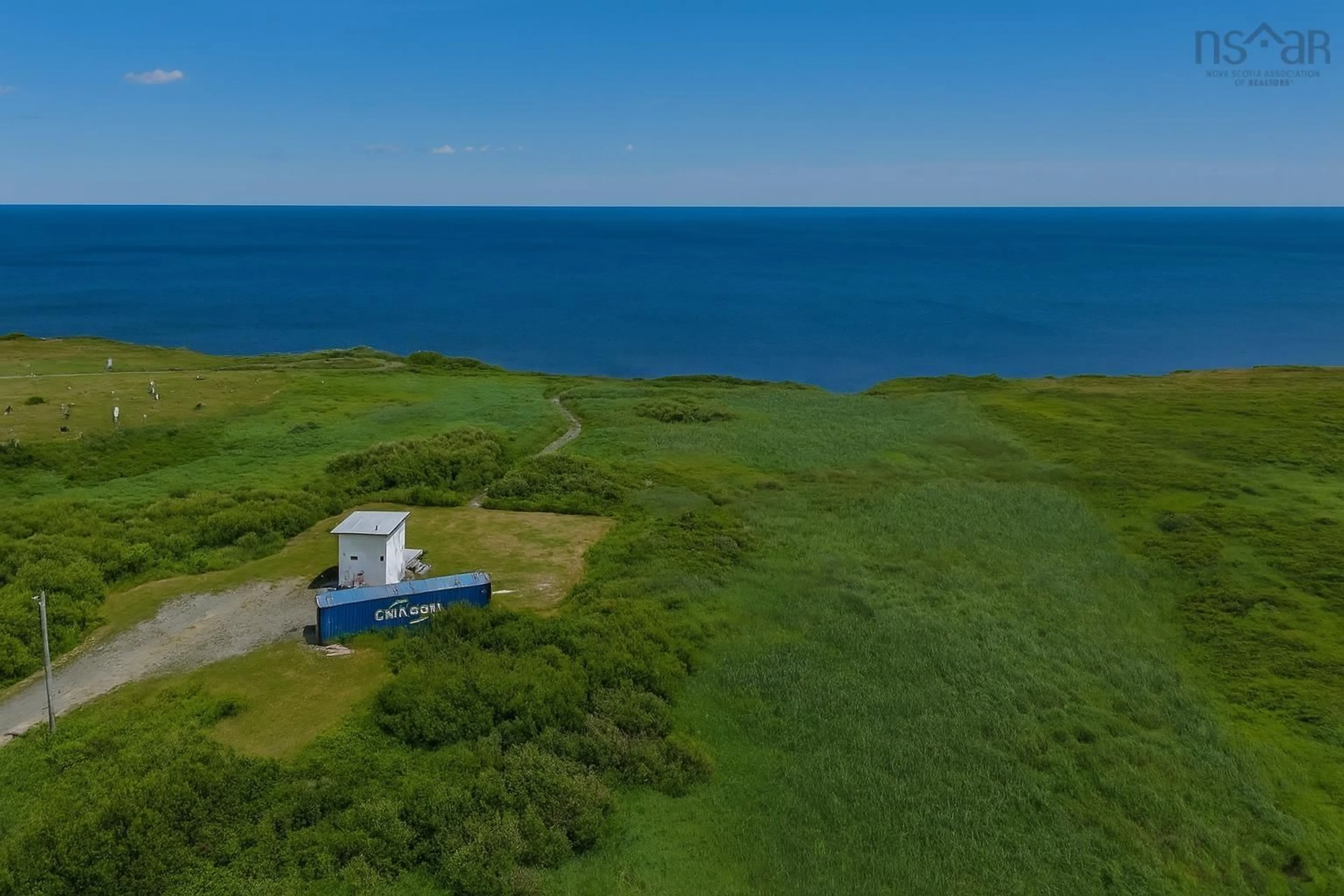 A pic from outside/outdoor area/front of a property/back of a property/a pic from drone, water/lake/river/ocean view for 132 Ocean Ave, Dominion Nova Scotia B1G 1R3