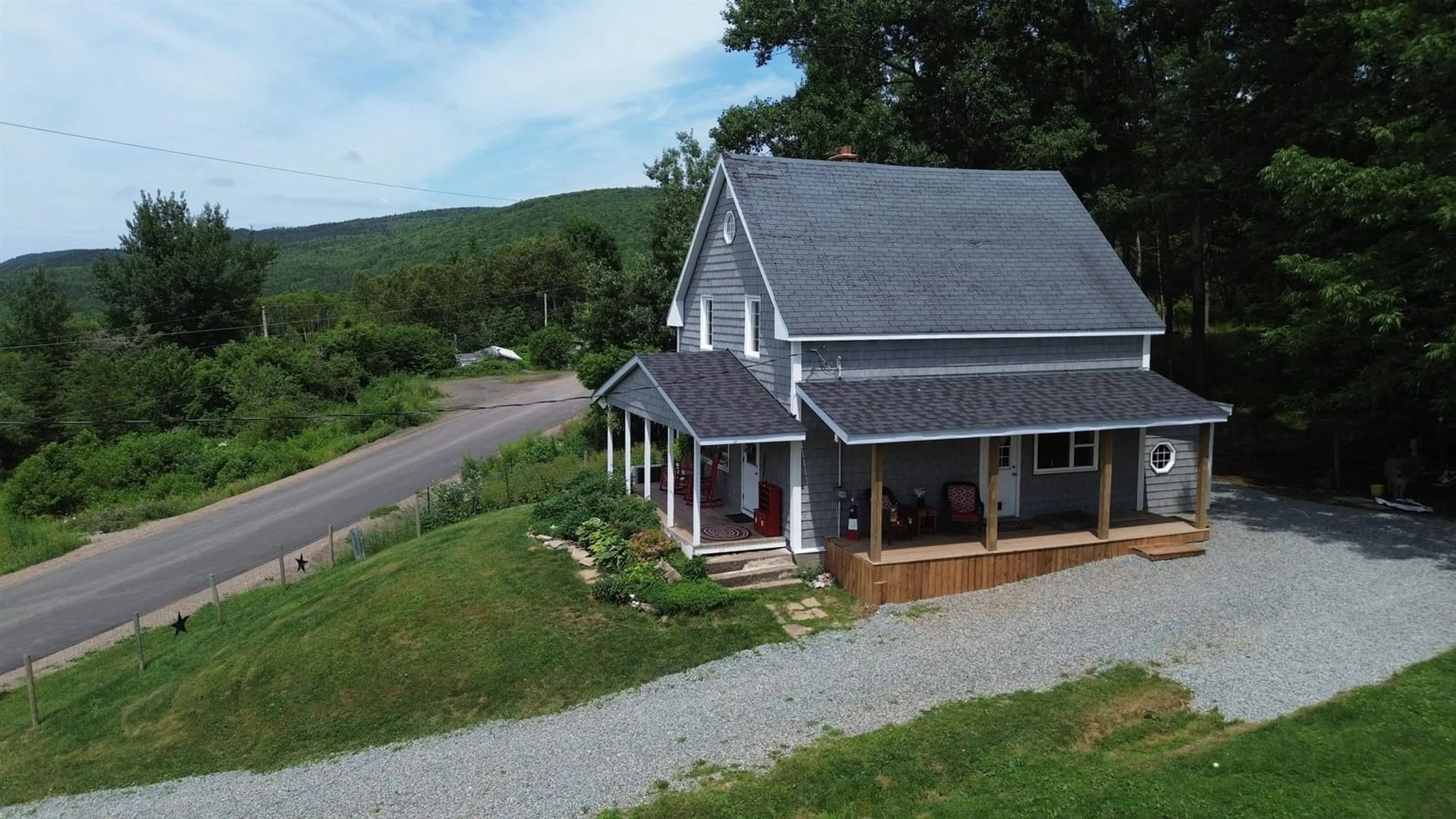A pic from outside/outdoor area/front of a property/back of a property/a pic from drone, mountain view for 230 Arsenaults Hill Rd, Margaree Nova Scotia B0E 2B0