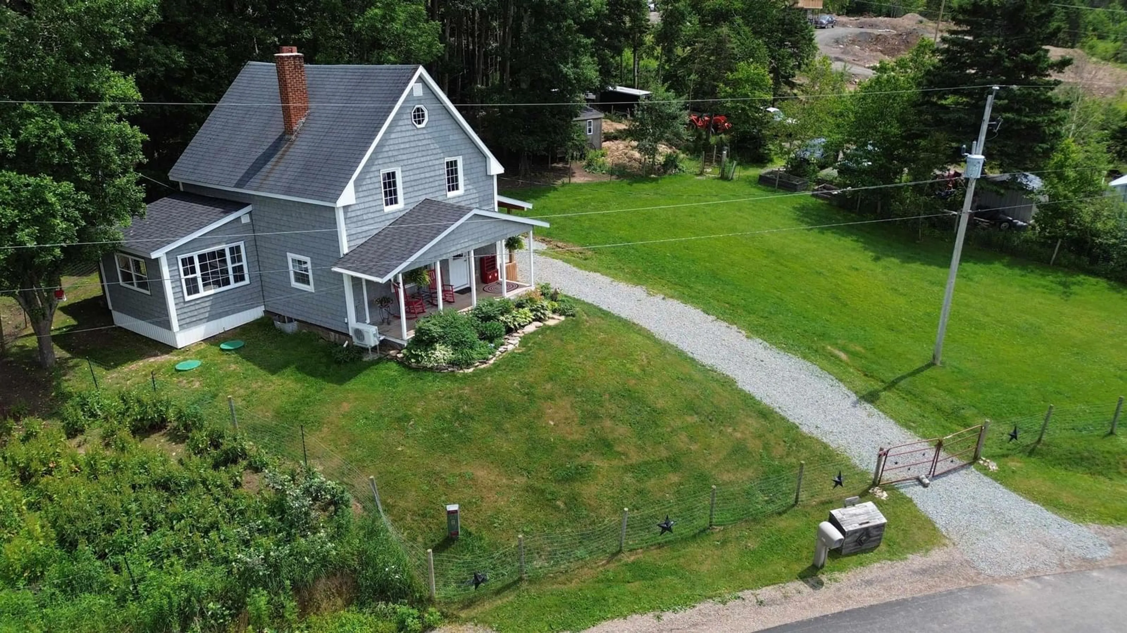 A pic from outside/outdoor area/front of a property/back of a property/a pic from drone, street for 230 Arsenaults Hill Rd, Margaree Nova Scotia B0E 2B0