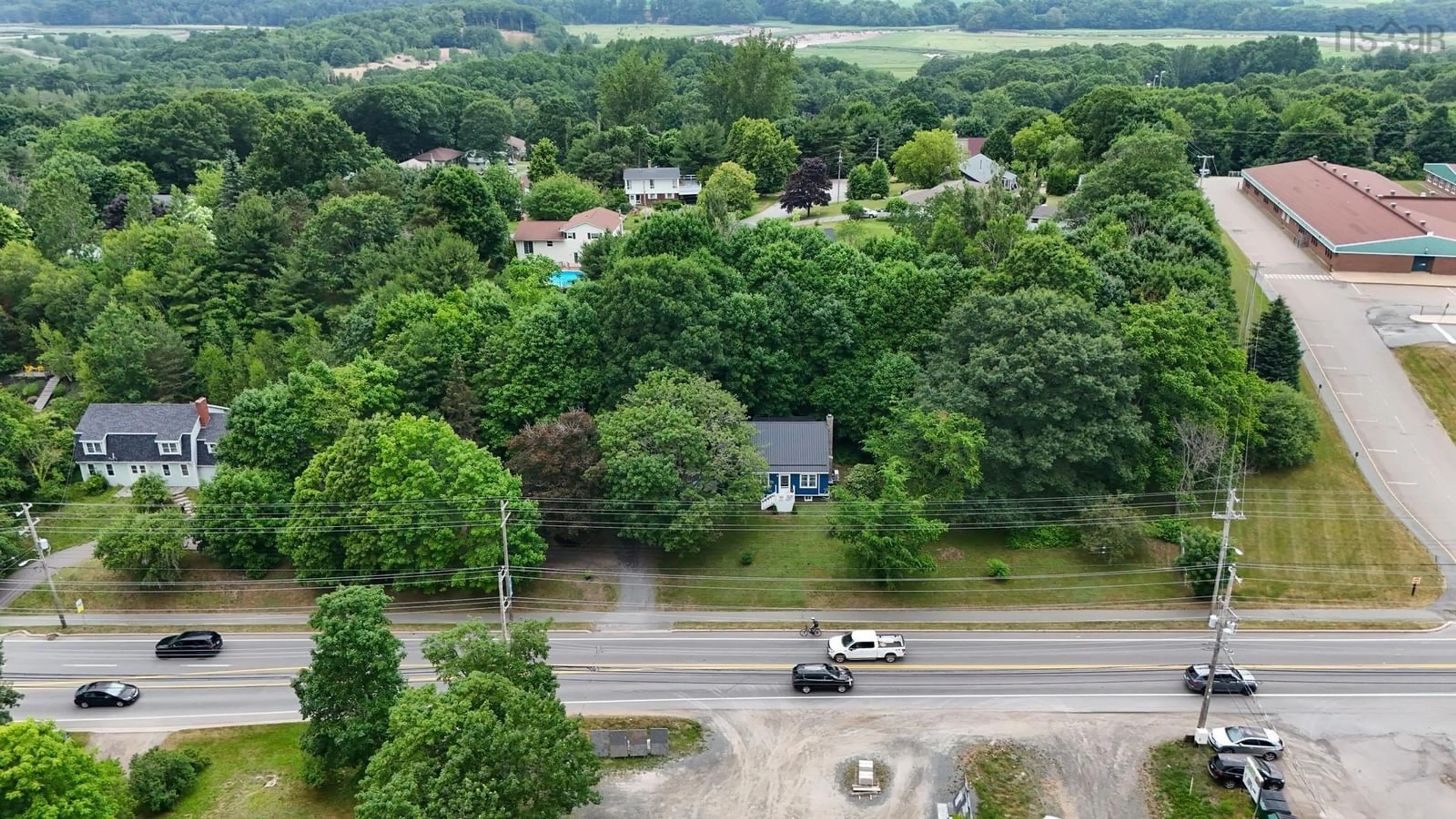 A pic from outside/outdoor area/front of a property/back of a property/a pic from drone, water/lake/river/ocean view for 9369 Commercial St, New Minas Nova Scotia B4N 3G3