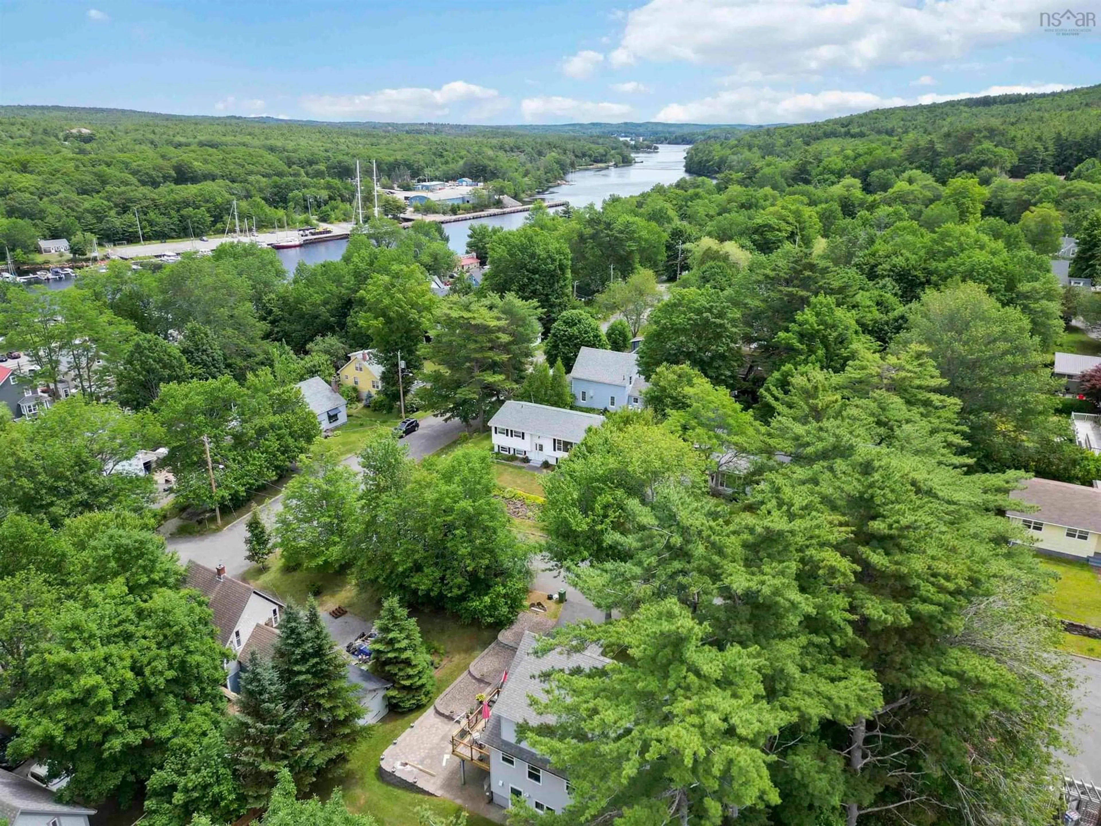 A pic from outside/outdoor area/front of a property/back of a property/a pic from drone, water/lake/river/ocean view for 5 Acadia St, Bridgewater Nova Scotia B4V 2A9