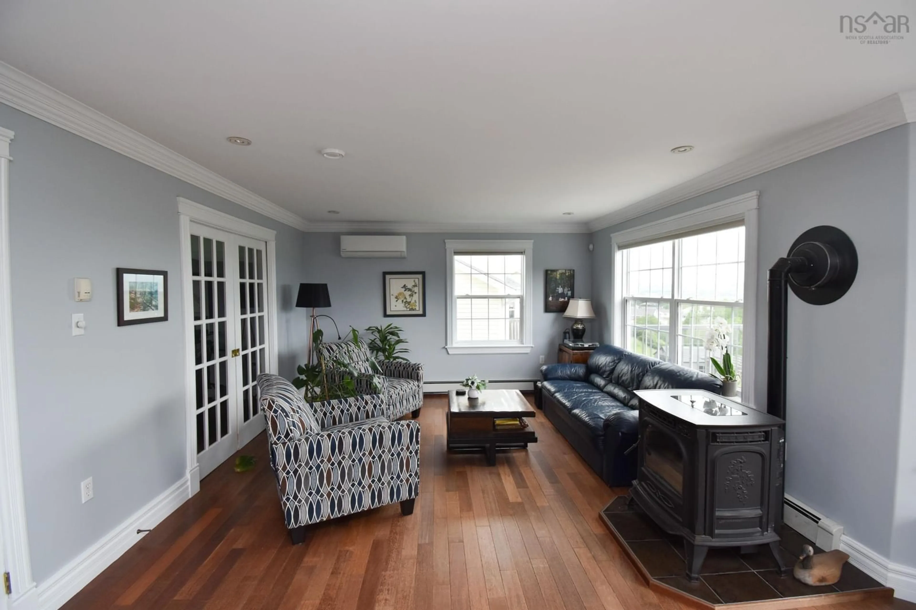 Living room with furniture, wood/laminate floor for 37 Coburg Cres, Truro Nova Scotia B2N 7J5