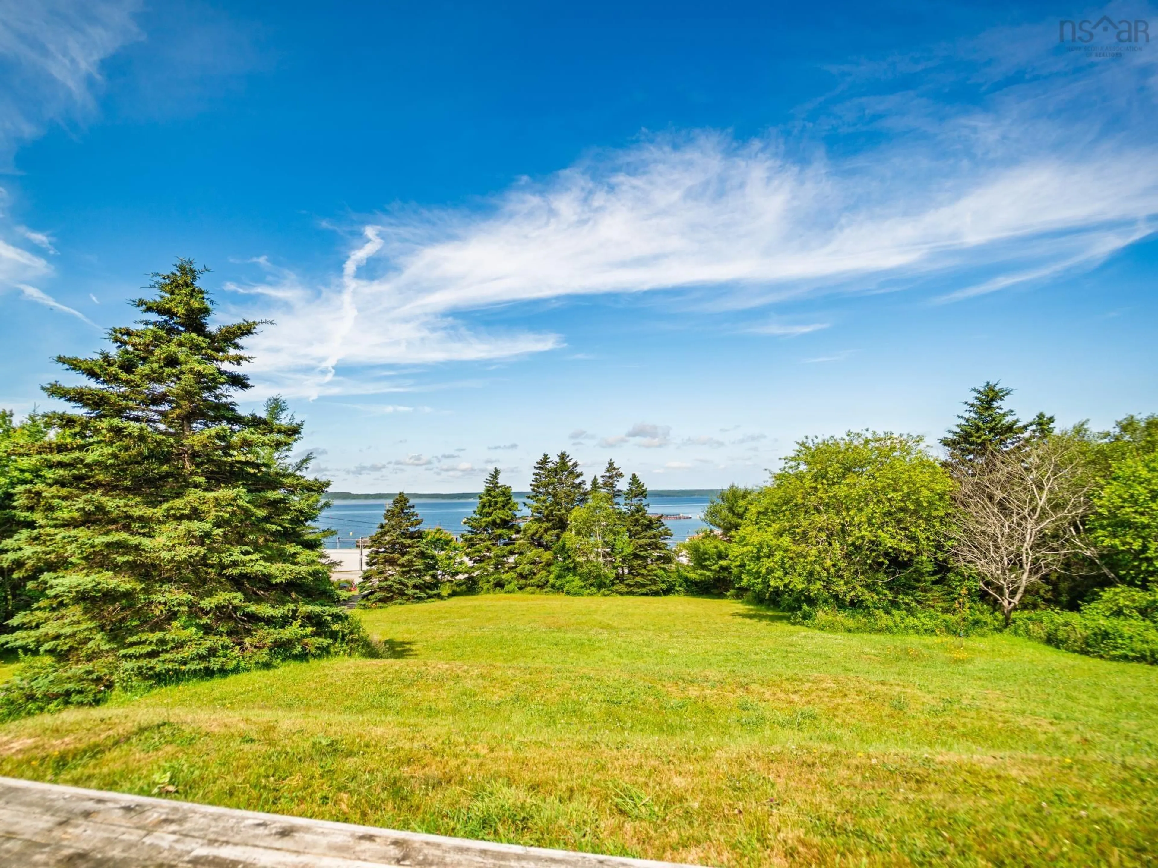 A pic from outside/outdoor area/front of a property/back of a property/a pic from drone, water/lake/river/ocean view for 887 Sandy Point Rd, Sandy Point Nova Scotia B0T 1W0