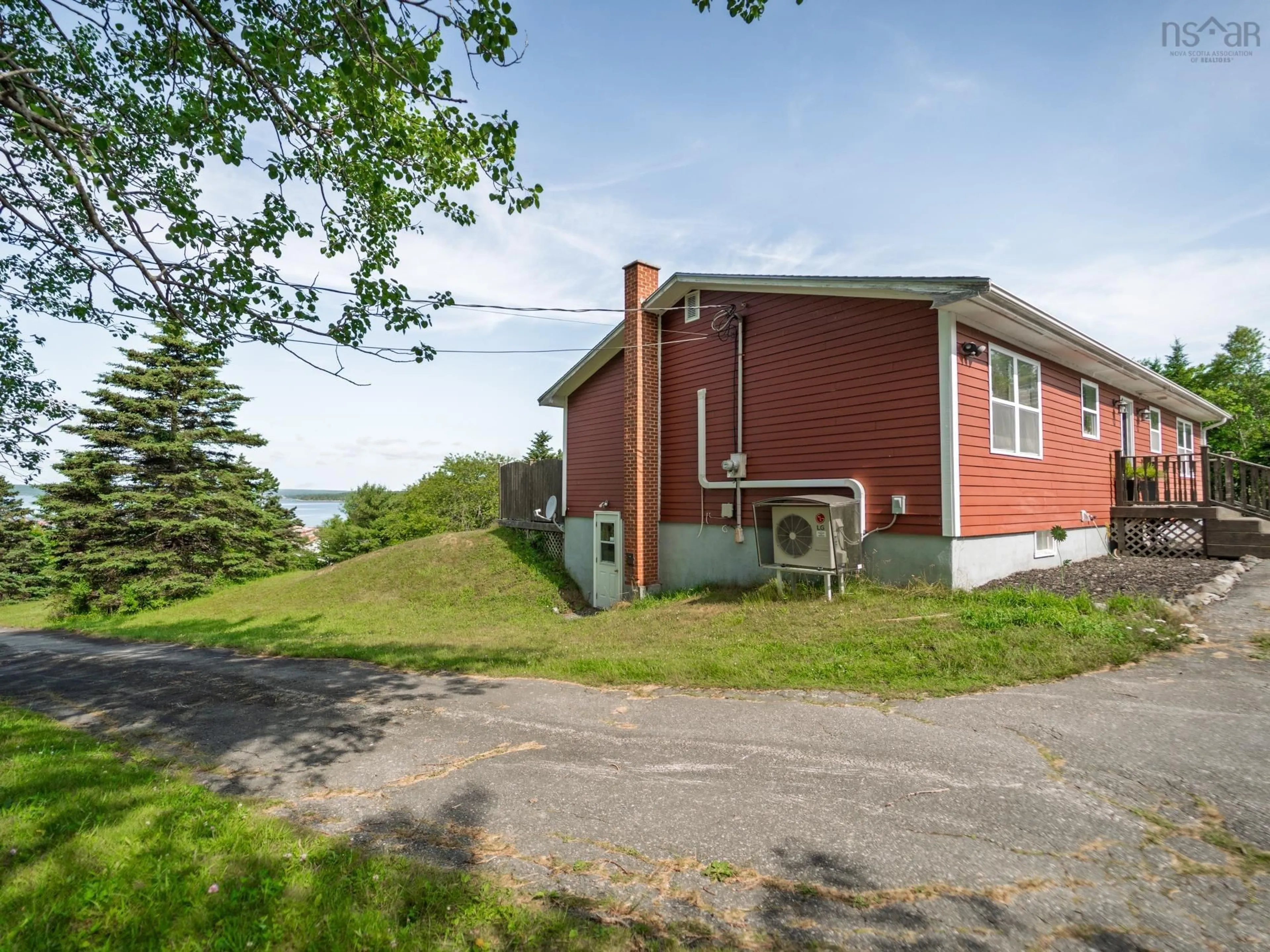 A pic from outside/outdoor area/front of a property/back of a property/a pic from drone, street for 887 Sandy Point Rd, Sandy Point Nova Scotia B0T 1W0