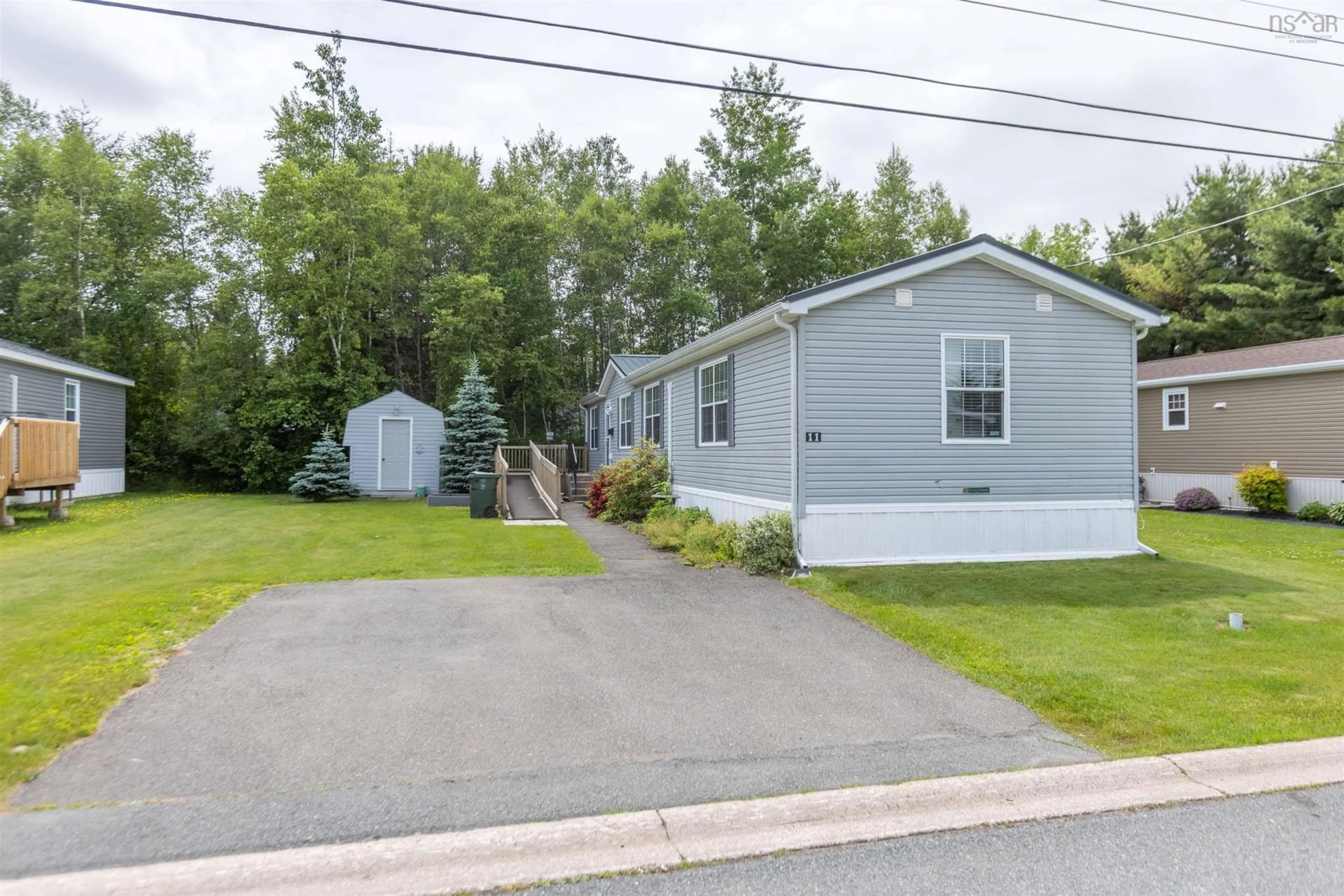 Home with vinyl exterior material, street for 11 Cumberland Ridge, Amherst Nova Scotia B4H 0B2