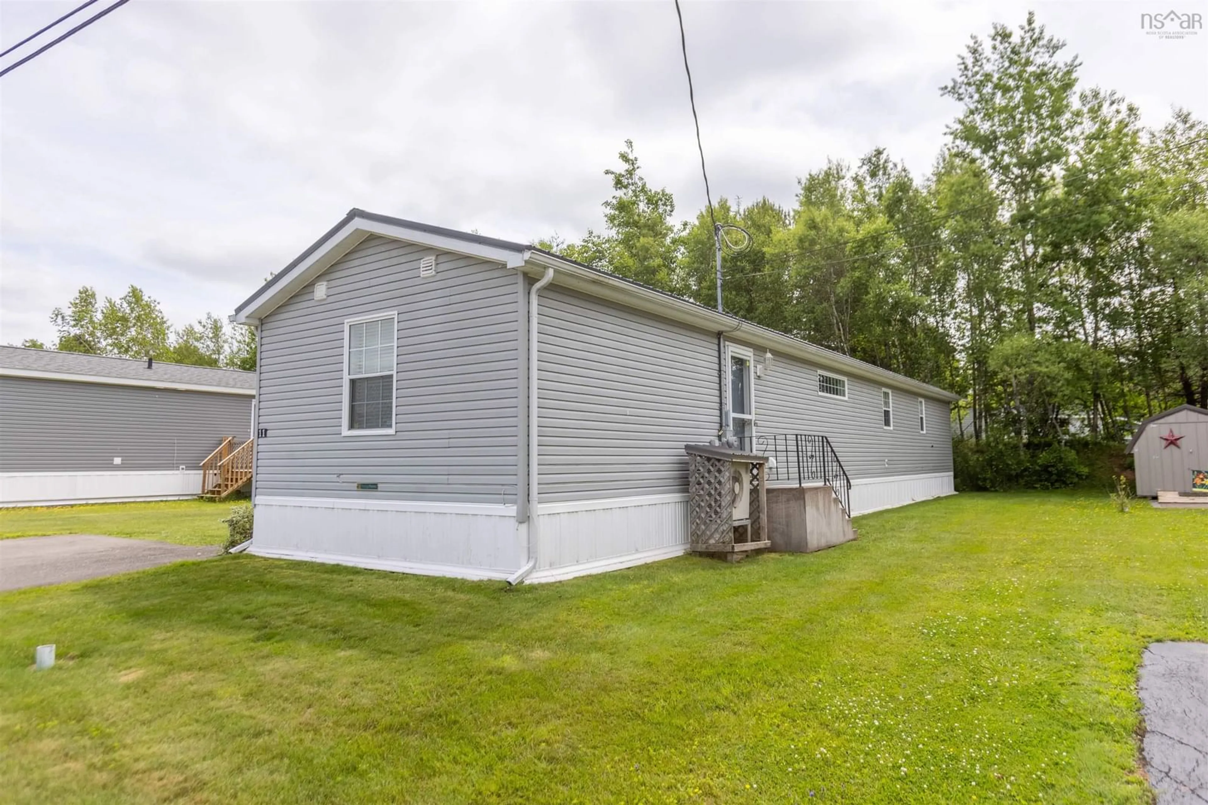 Home with vinyl exterior material, street for 11 Cumberland Ridge, Amherst Nova Scotia B4H 0B2