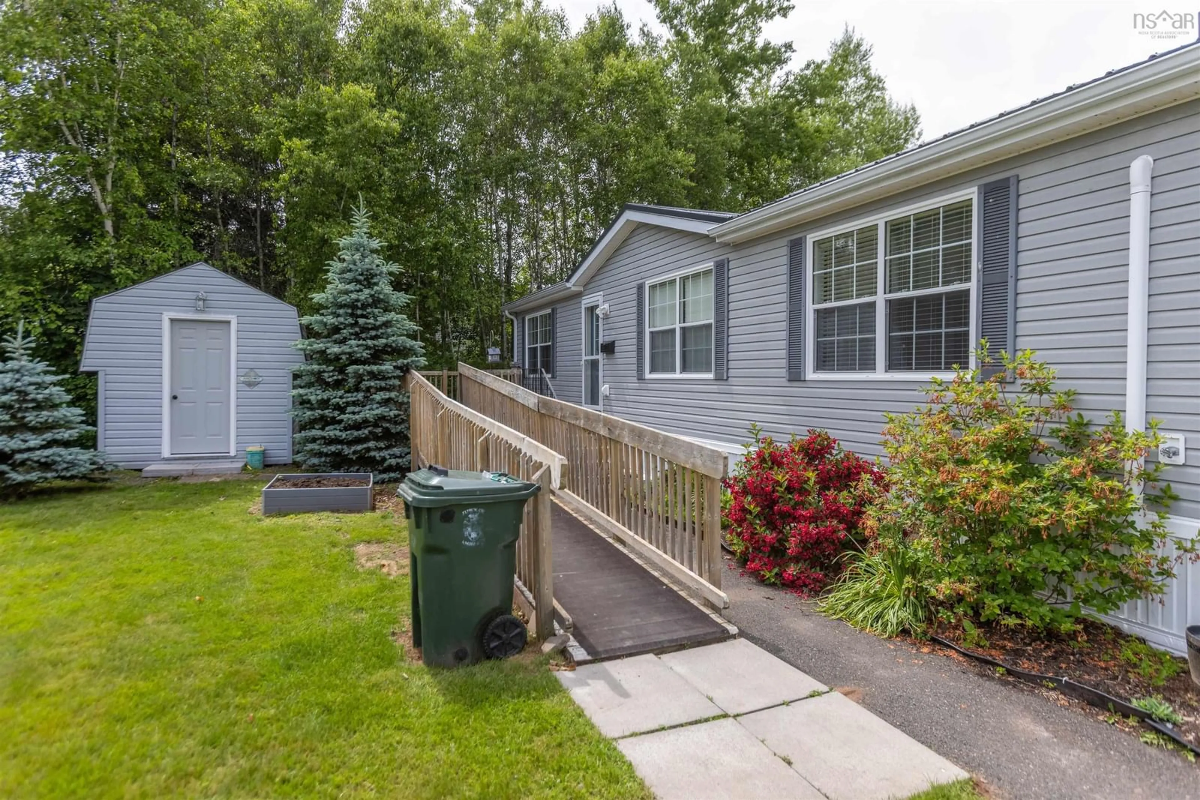 Home with vinyl exterior material, street for 11 Cumberland Ridge, Amherst Nova Scotia B4H 0B2