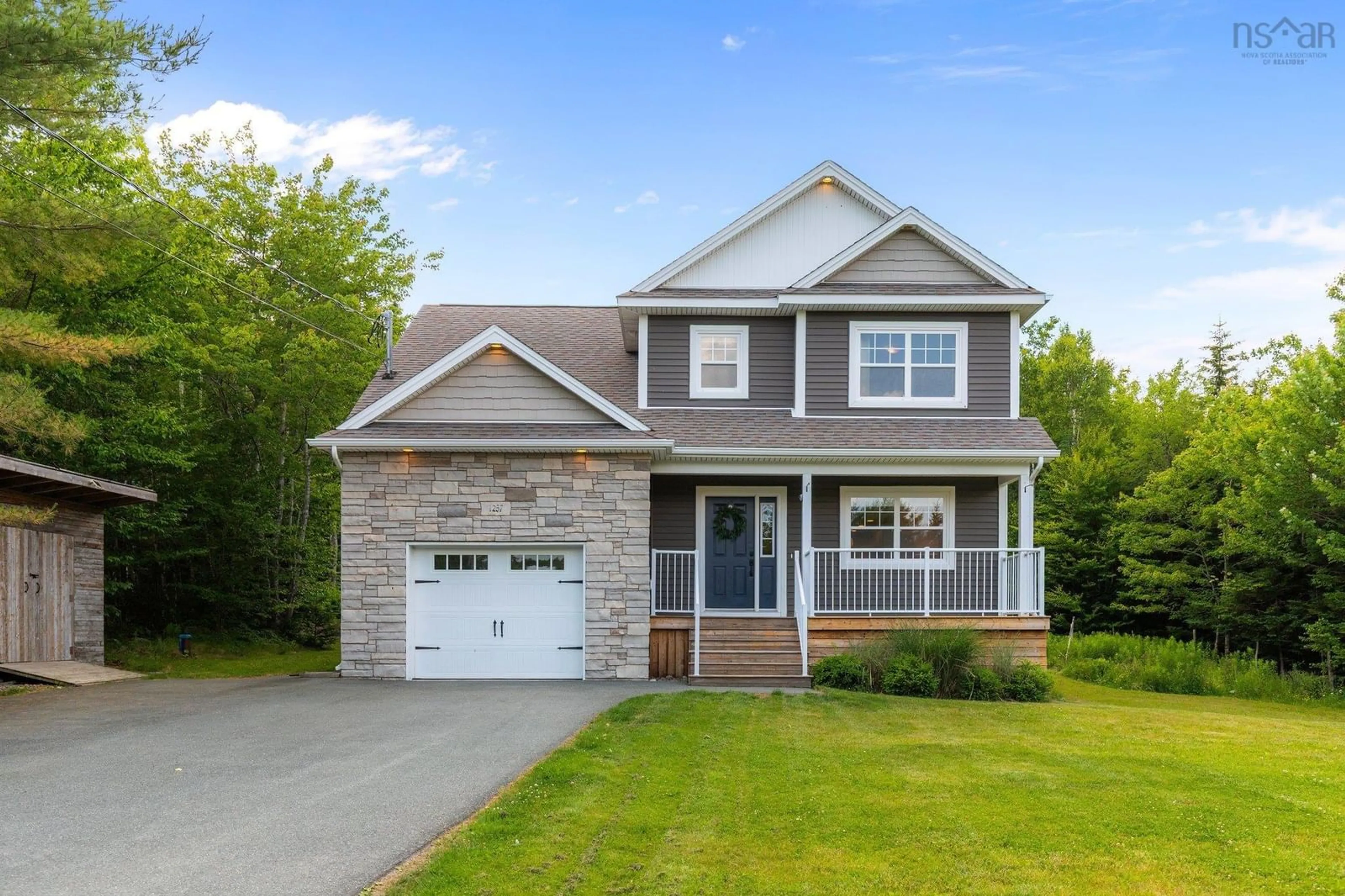 Home with vinyl exterior material, street for 1257 Westwood Blvd, Upper Tantallon Nova Scotia B3Z 0M2