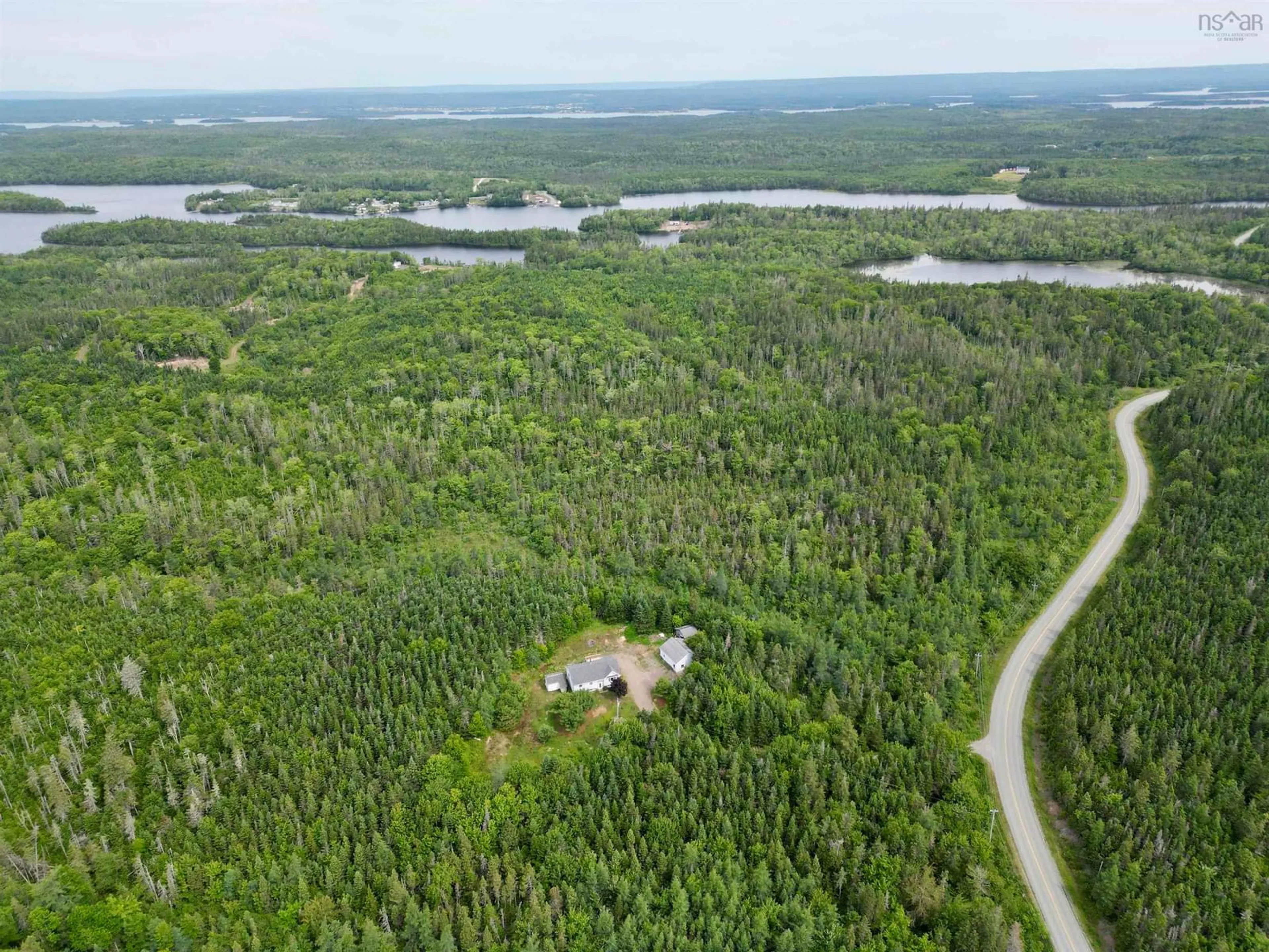A pic from outside/outdoor area/front of a property/back of a property/a pic from drone, forest/trees view for 805 Grandique Rd, Arichat Nova Scotia B0E 1A0