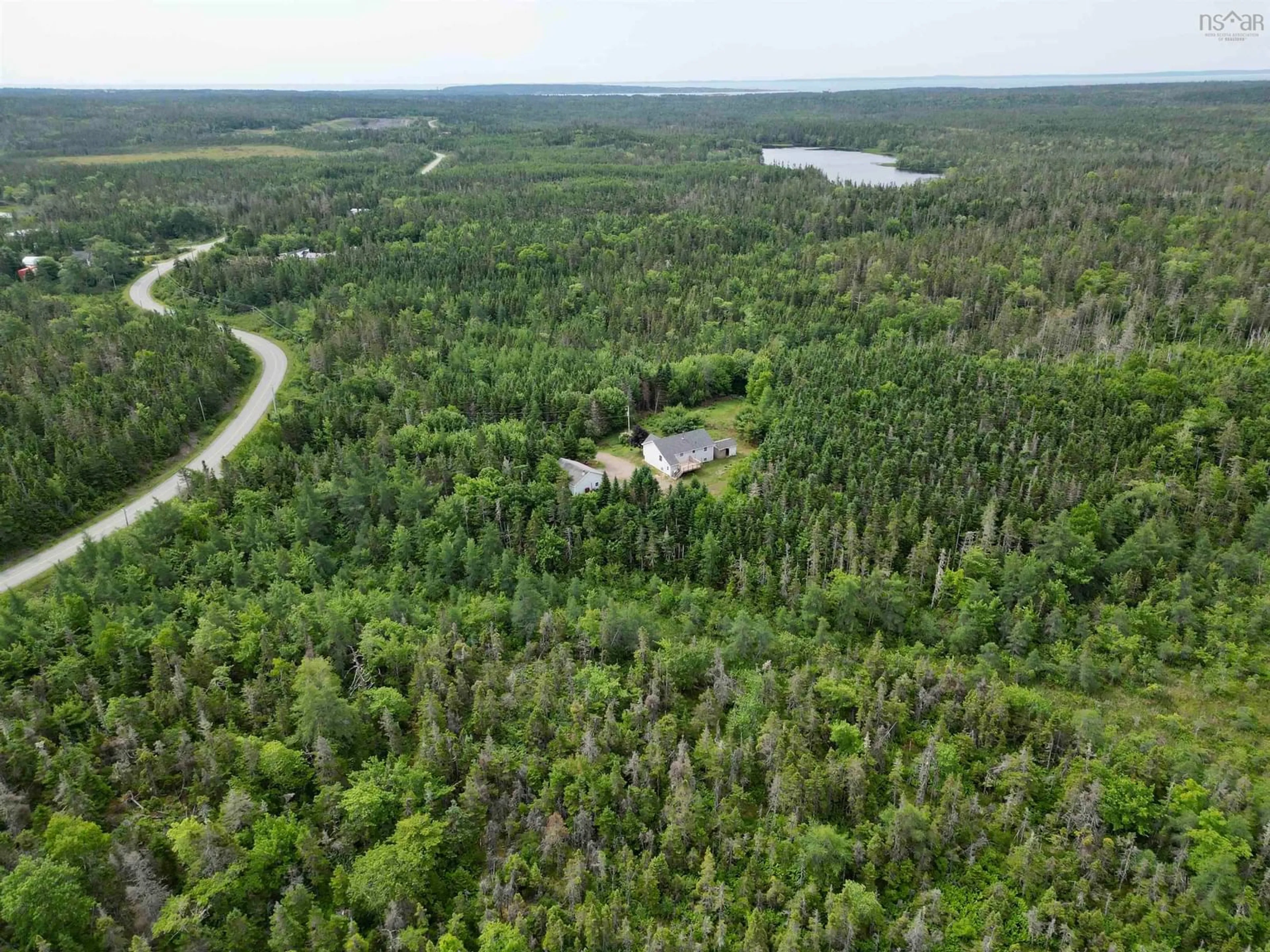 A pic from outside/outdoor area/front of a property/back of a property/a pic from drone, forest/trees view for 805 Grandique Rd, Arichat Nova Scotia B0E 1A0