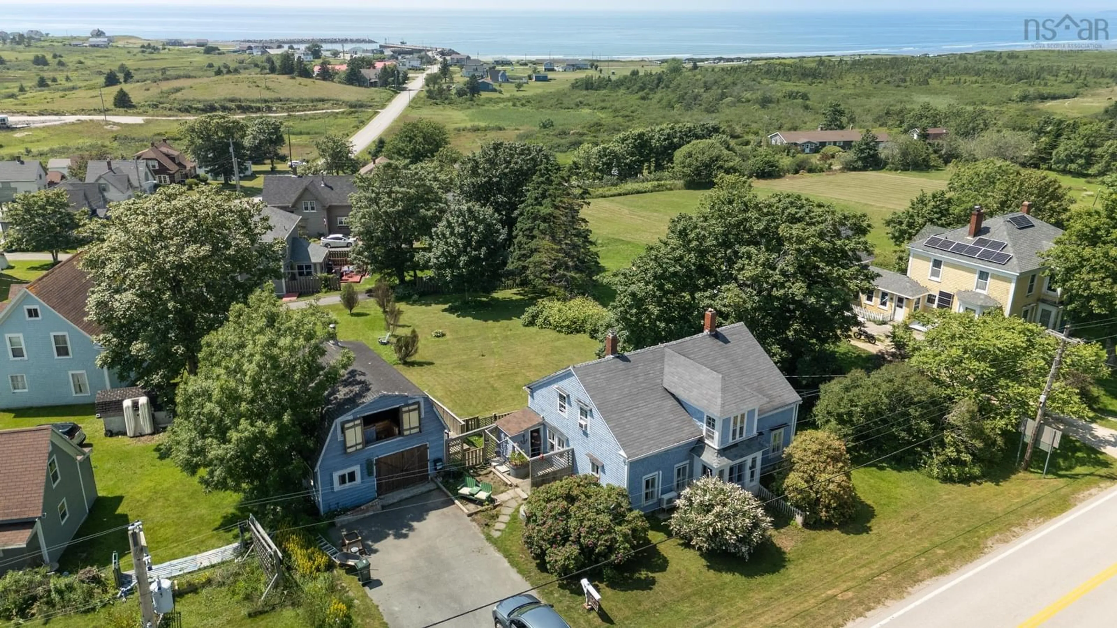 A pic from outside/outdoor area/front of a property/back of a property/a pic from drone, water/lake/river/ocean view for 3213 Highway 1, Port Maitland Nova Scotia B5A 5T4