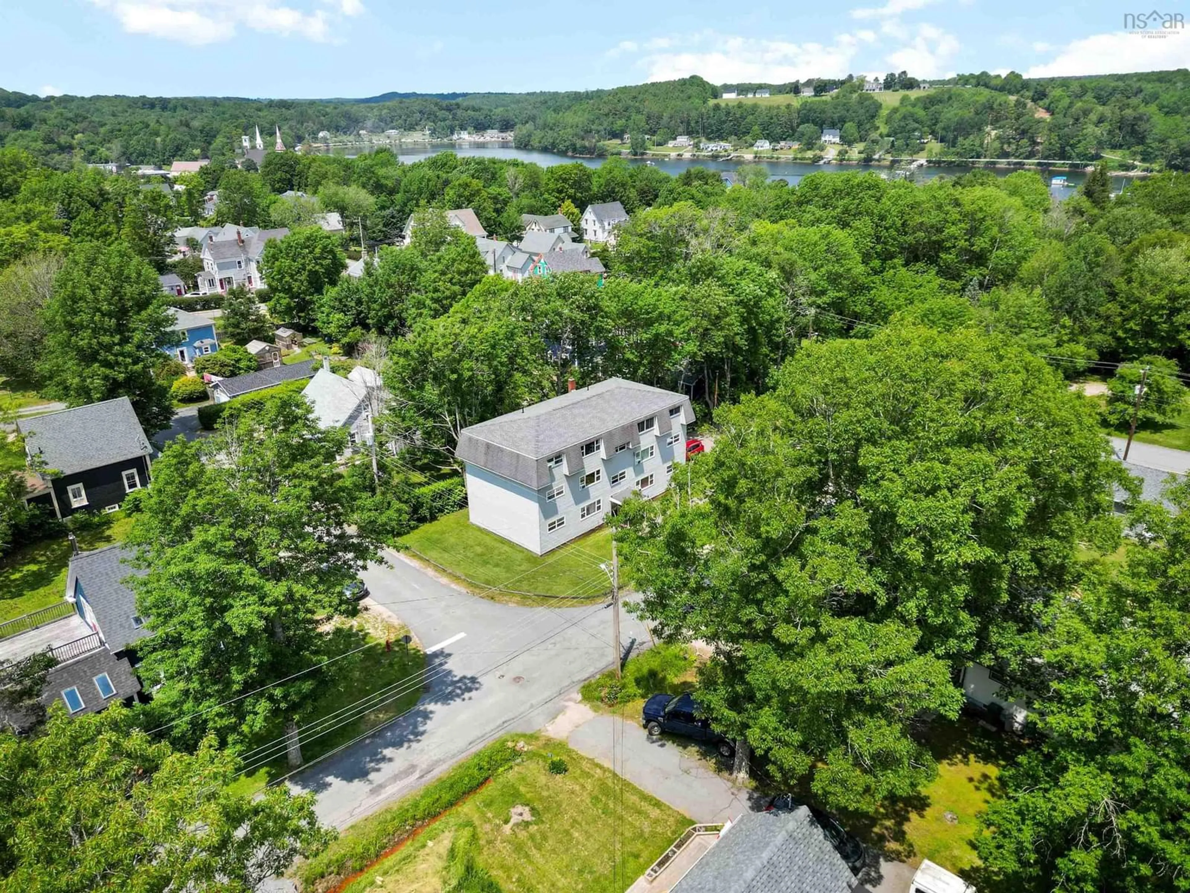 A pic from outside/outdoor area/front of a property/back of a property/a pic from drone, unknown for 68 Spruce St, Mahone Bay Nova Scotia B0J 2E0