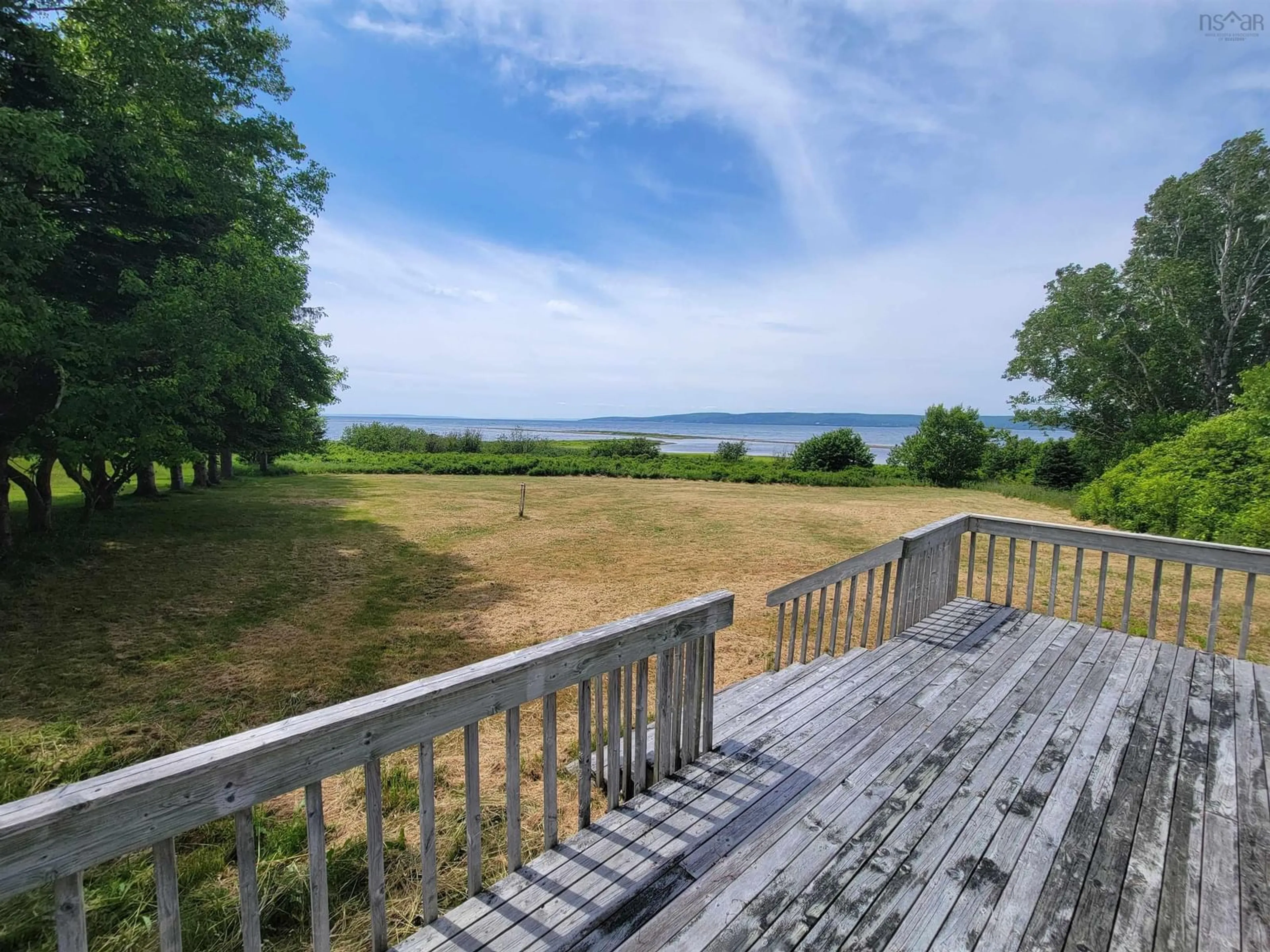 A pic from outside/outdoor area/front of a property/back of a property/a pic from drone, water/lake/river/ocean view for 8356 East Bay Hwy, Big Pond Nova Scotia B1J 1Z6