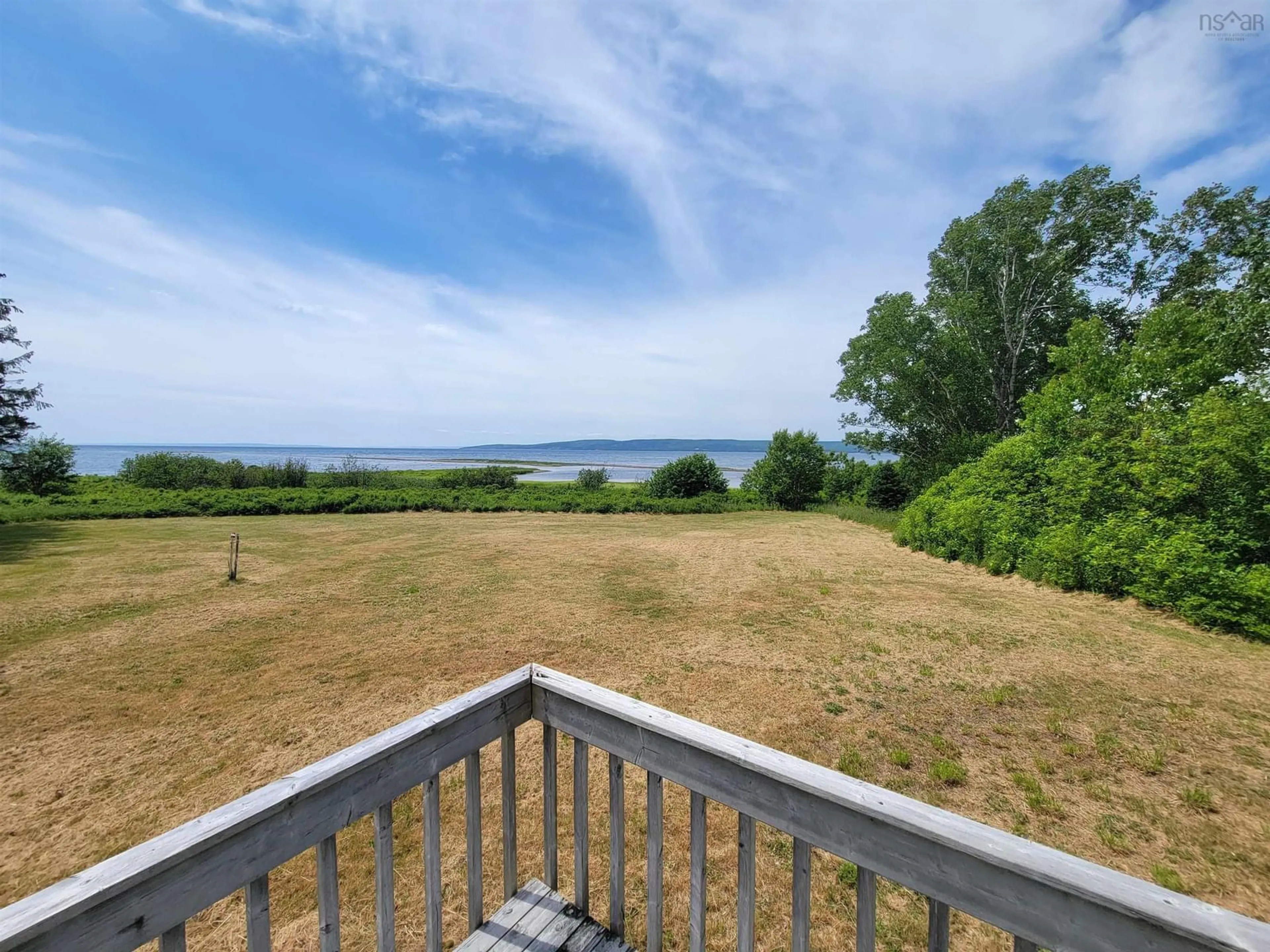 A pic from outside/outdoor area/front of a property/back of a property/a pic from drone, water/lake/river/ocean view for 8356 East Bay Hwy, Big Pond Nova Scotia B1J 1Z6