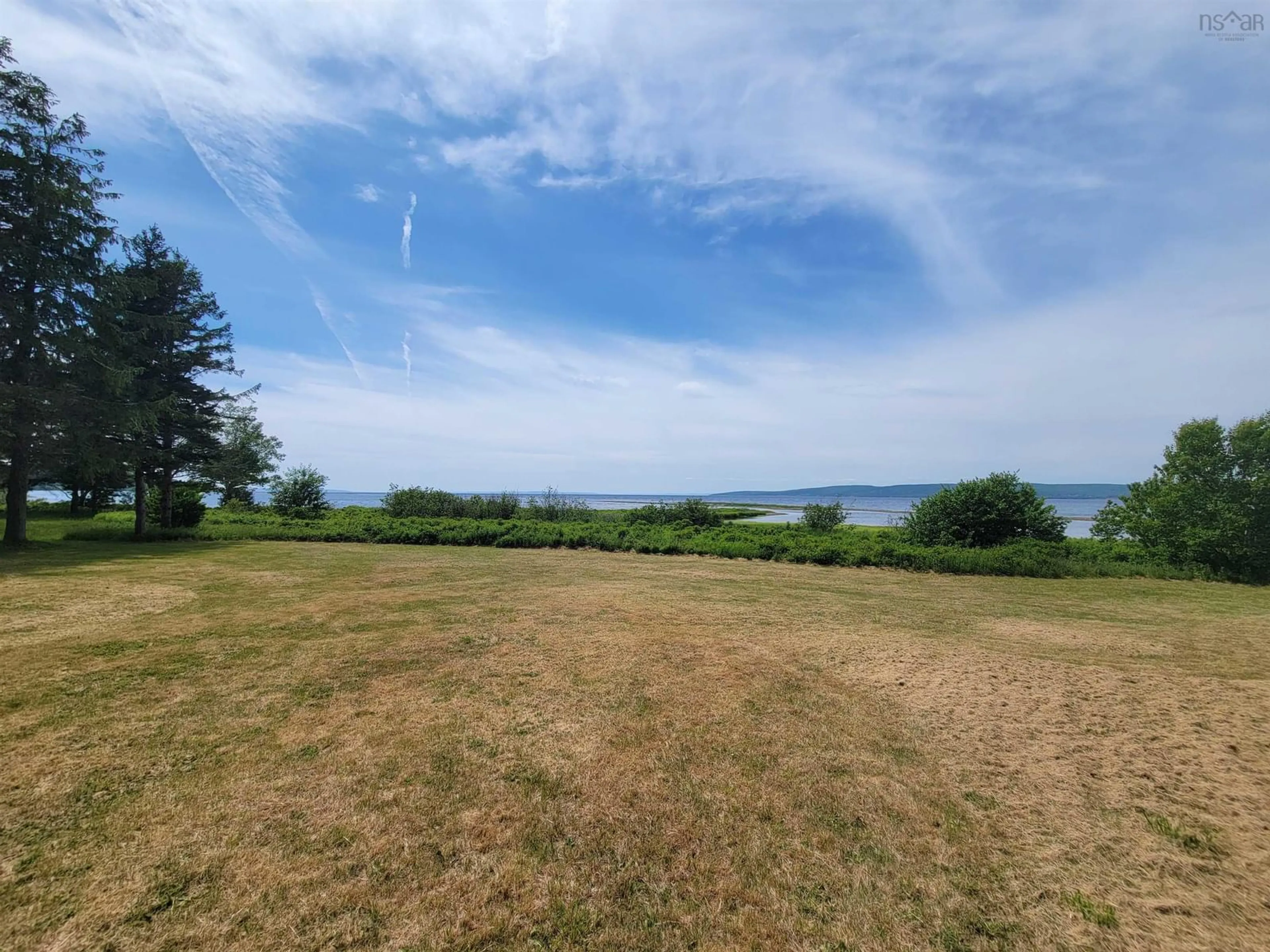 A pic from outside/outdoor area/front of a property/back of a property/a pic from drone, water/lake/river/ocean view for 8356 East Bay Hwy, Big Pond Nova Scotia B1J 1Z6
