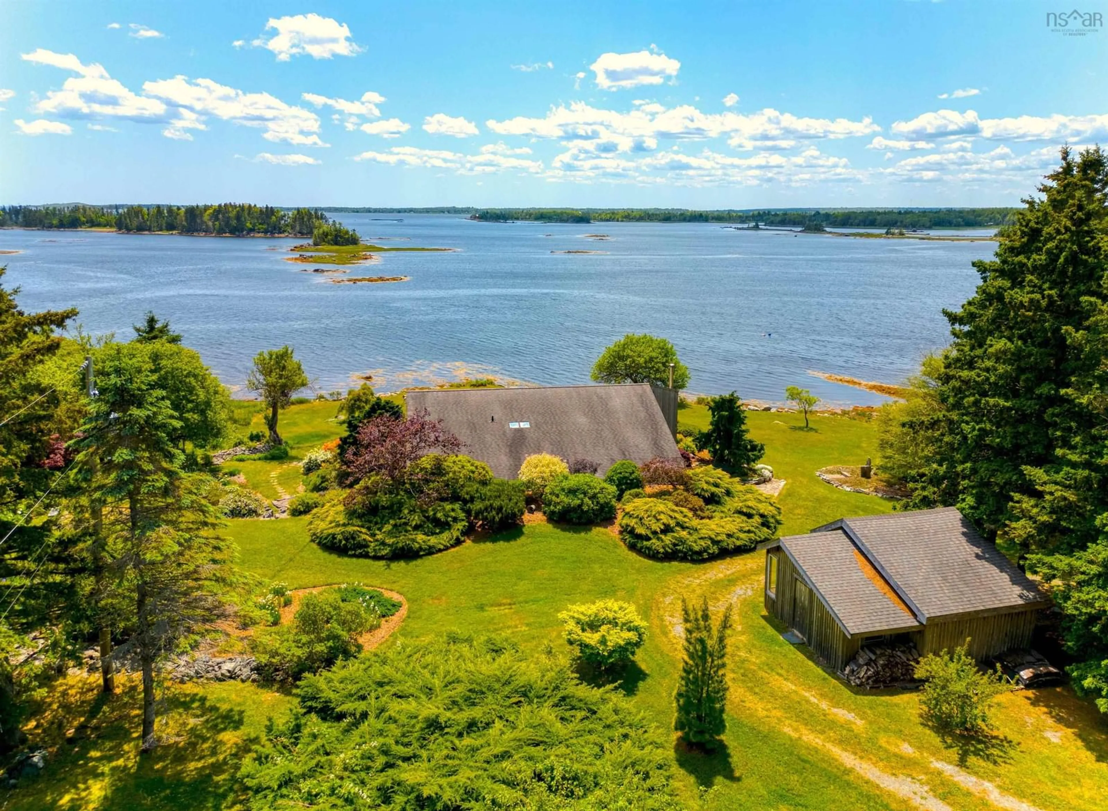 A pic from outside/outdoor area/front of a property/back of a property/a pic from drone, water/lake/river/ocean view for 19 & 42 Indian Bay Rd, Voglers Cove Nova Scotia B0J 2H0