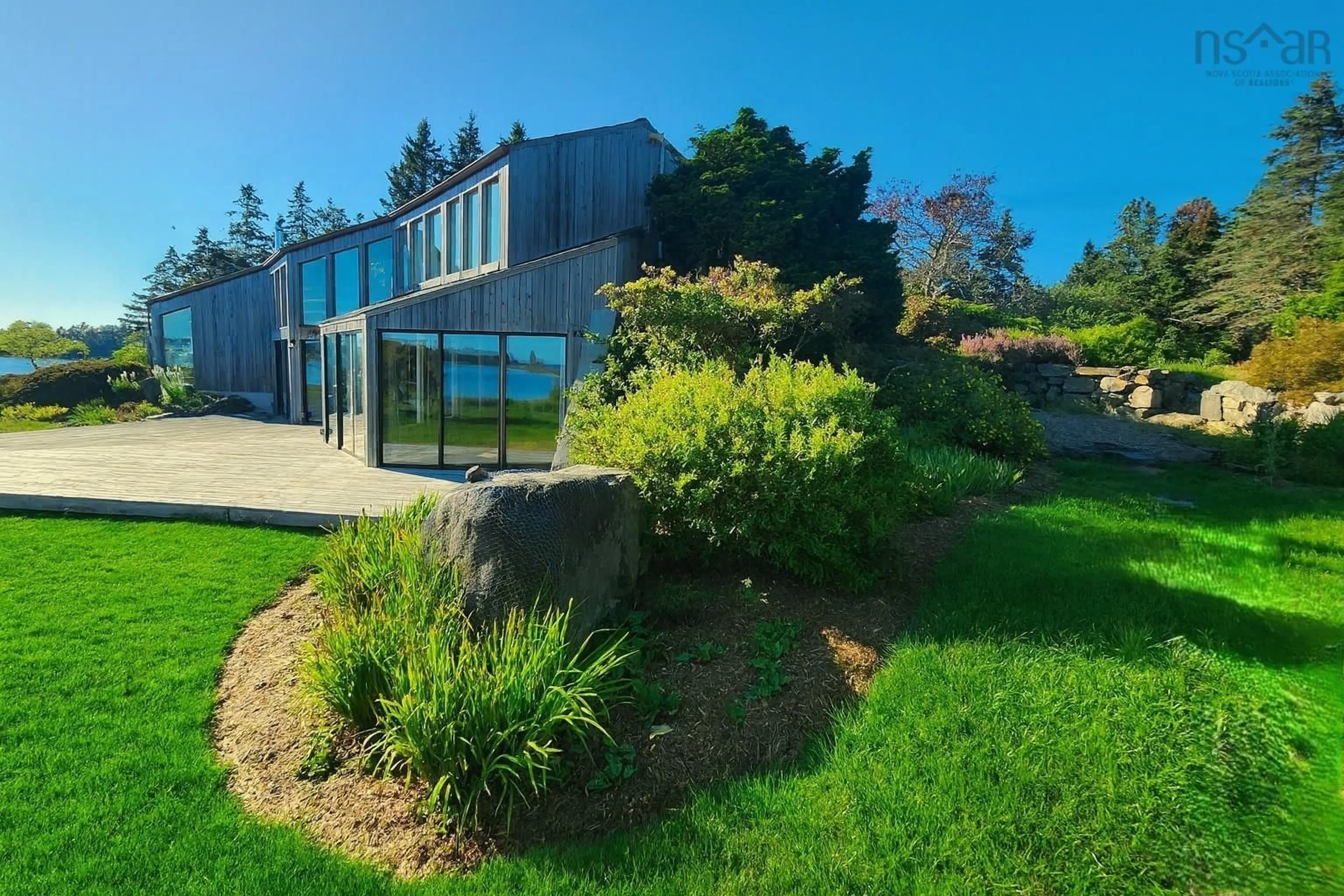 A pic from outside/outdoor area/front of a property/back of a property/a pic from drone, water/lake/river/ocean view for 42 Indian Bay Rd, Voglers Cove Nova Scotia B0J 2H0