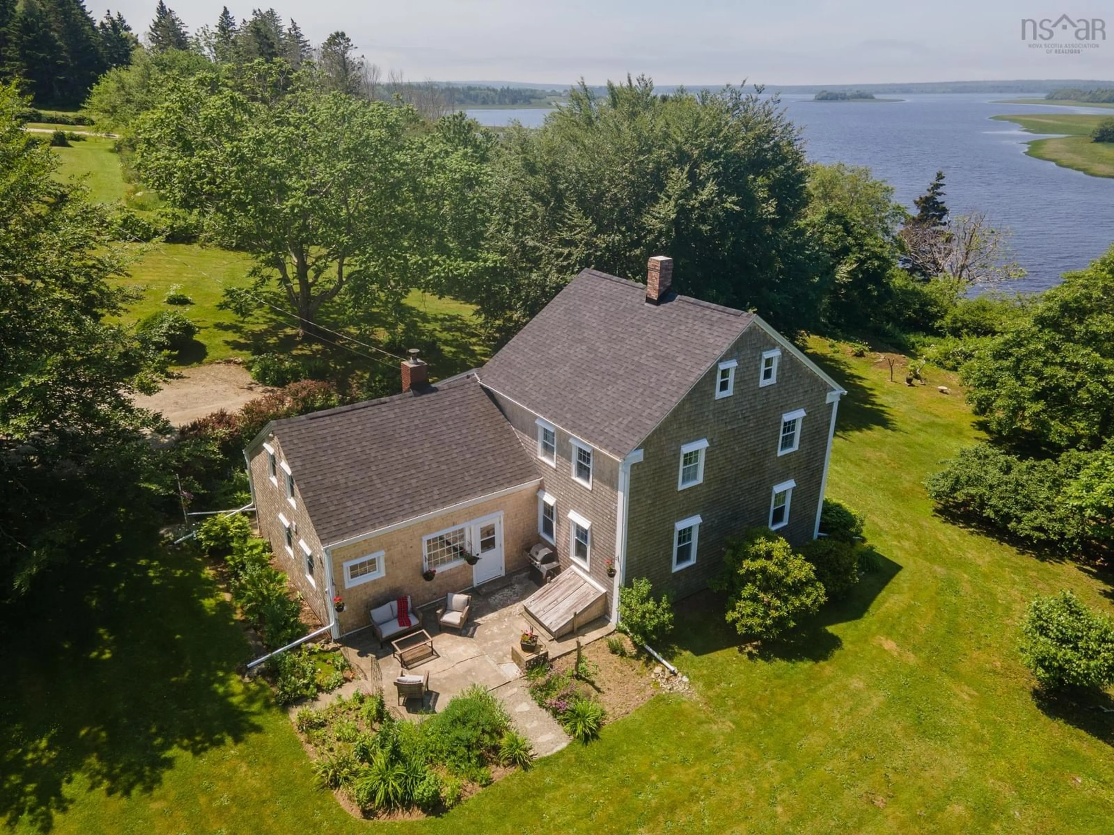 A pic from outside/outdoor area/front of a property/back of a property/a pic from drone, water/lake/river/ocean view for 61 Horatio Wood Rd, Tusket Nova Scotia B0W 3M0