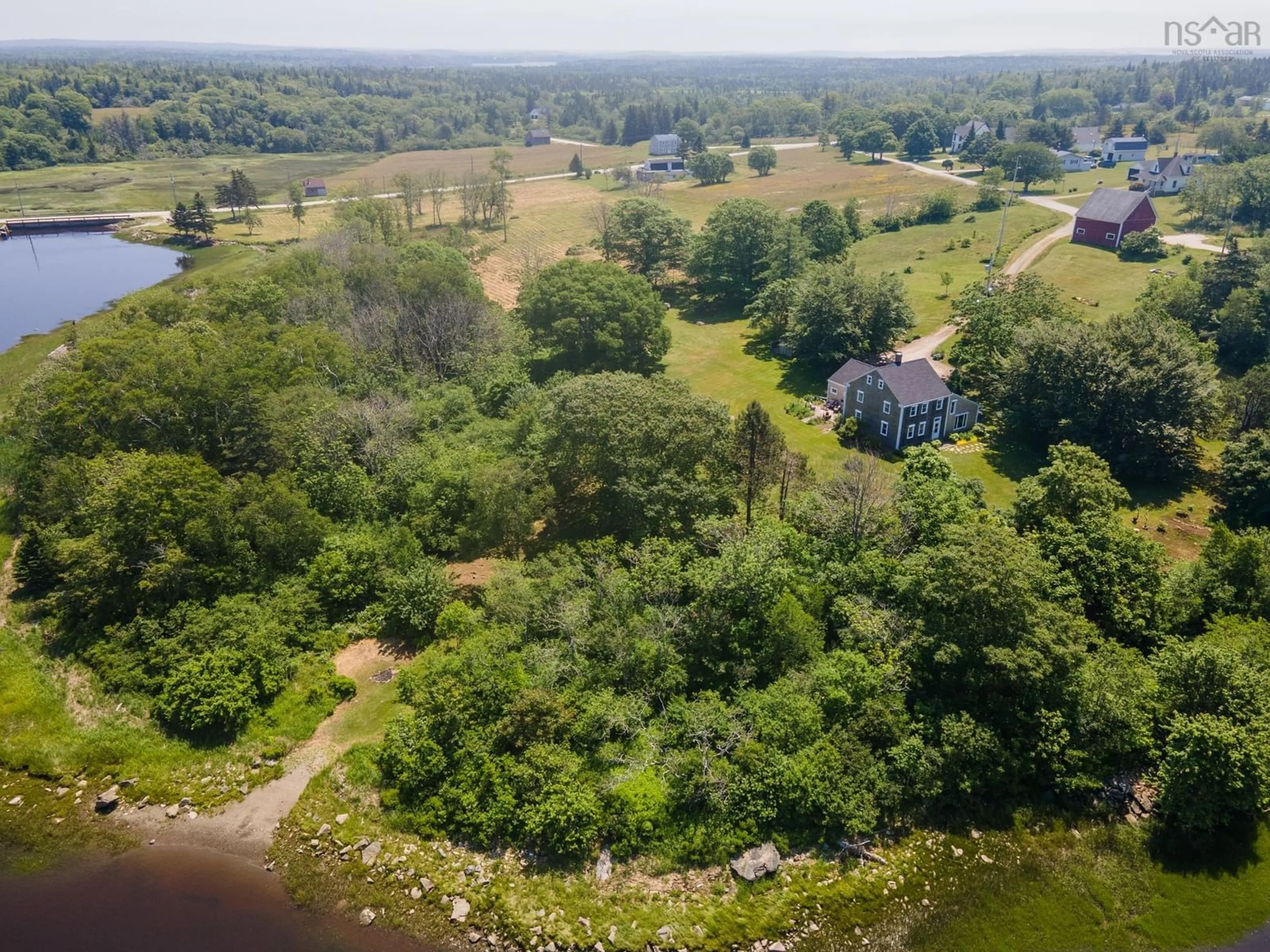A pic from outside/outdoor area/front of a property/back of a property/a pic from drone, water/lake/river/ocean view for 61 Horatio Wood Rd, Tusket Nova Scotia B0W 3M0