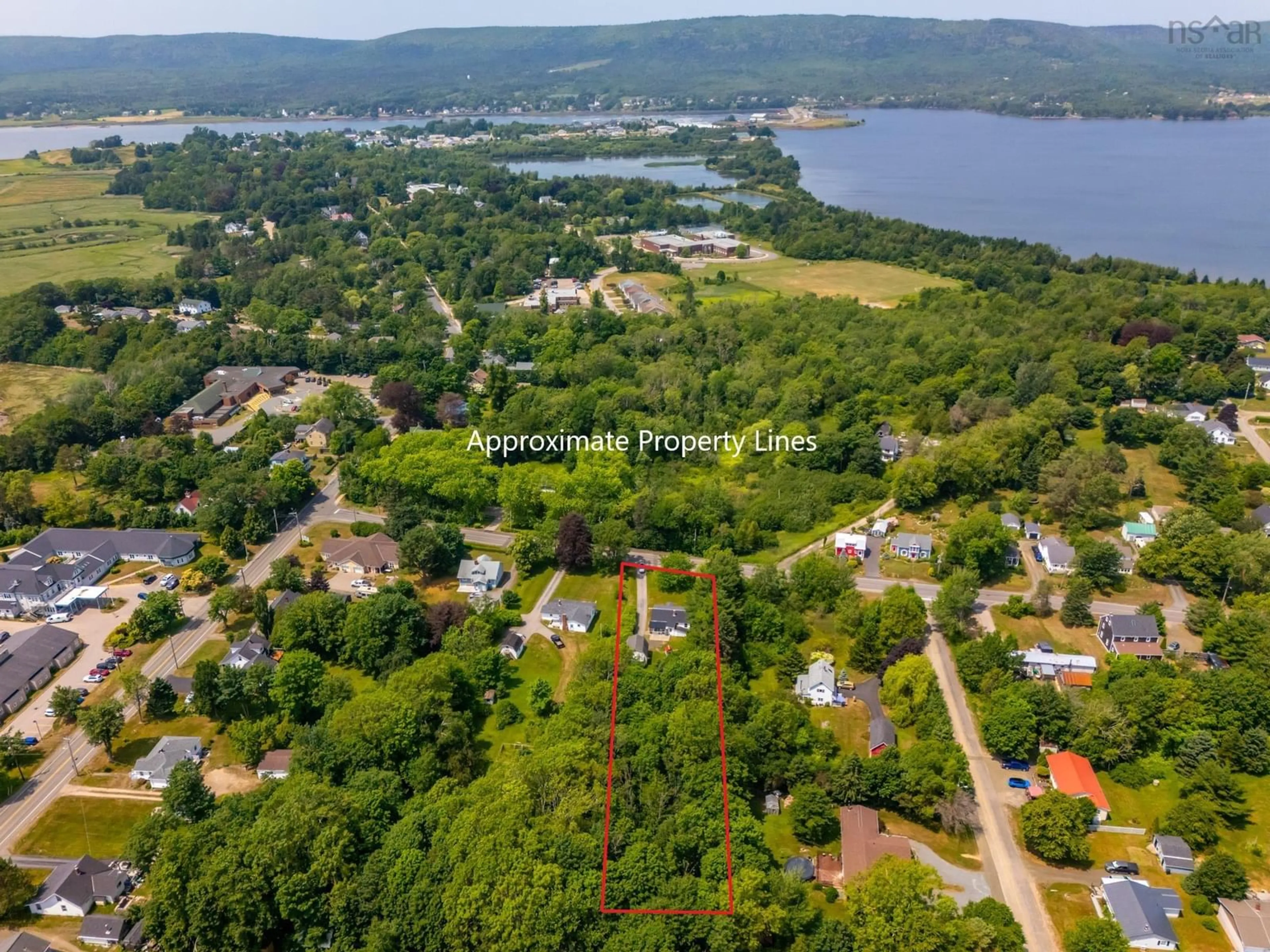 A pic from outside/outdoor area/front of a property/back of a property/a pic from drone, water/lake/river/ocean view for 26 Highway 201, Lequille Nova Scotia B0S 1A0