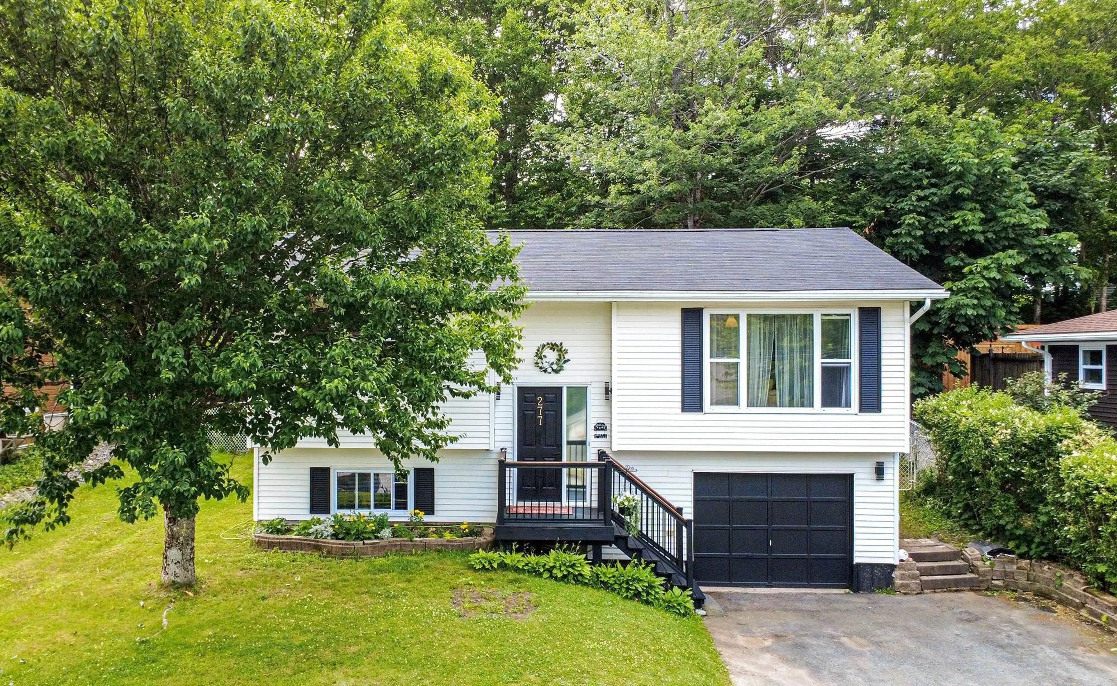 Home with vinyl exterior material, street for 277 Beaver Bank Cross Rd, Middle Sackville Nova Scotia B4E 2E7