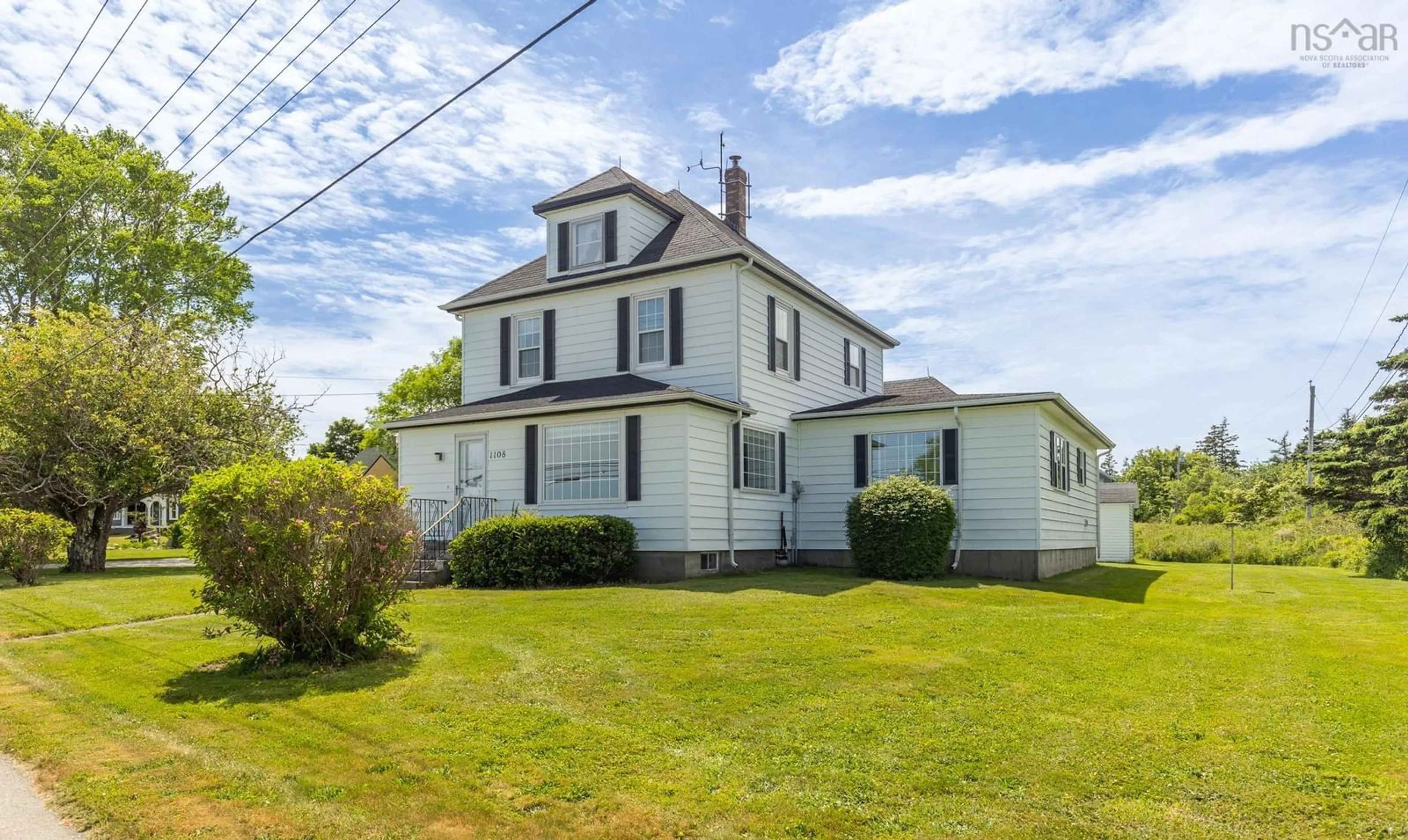 A pic from outside/outdoor area/front of a property/back of a property/a pic from drone, building for 1108 Highway 335, Middle West Pubnico Nova Scotia B0W 3S0