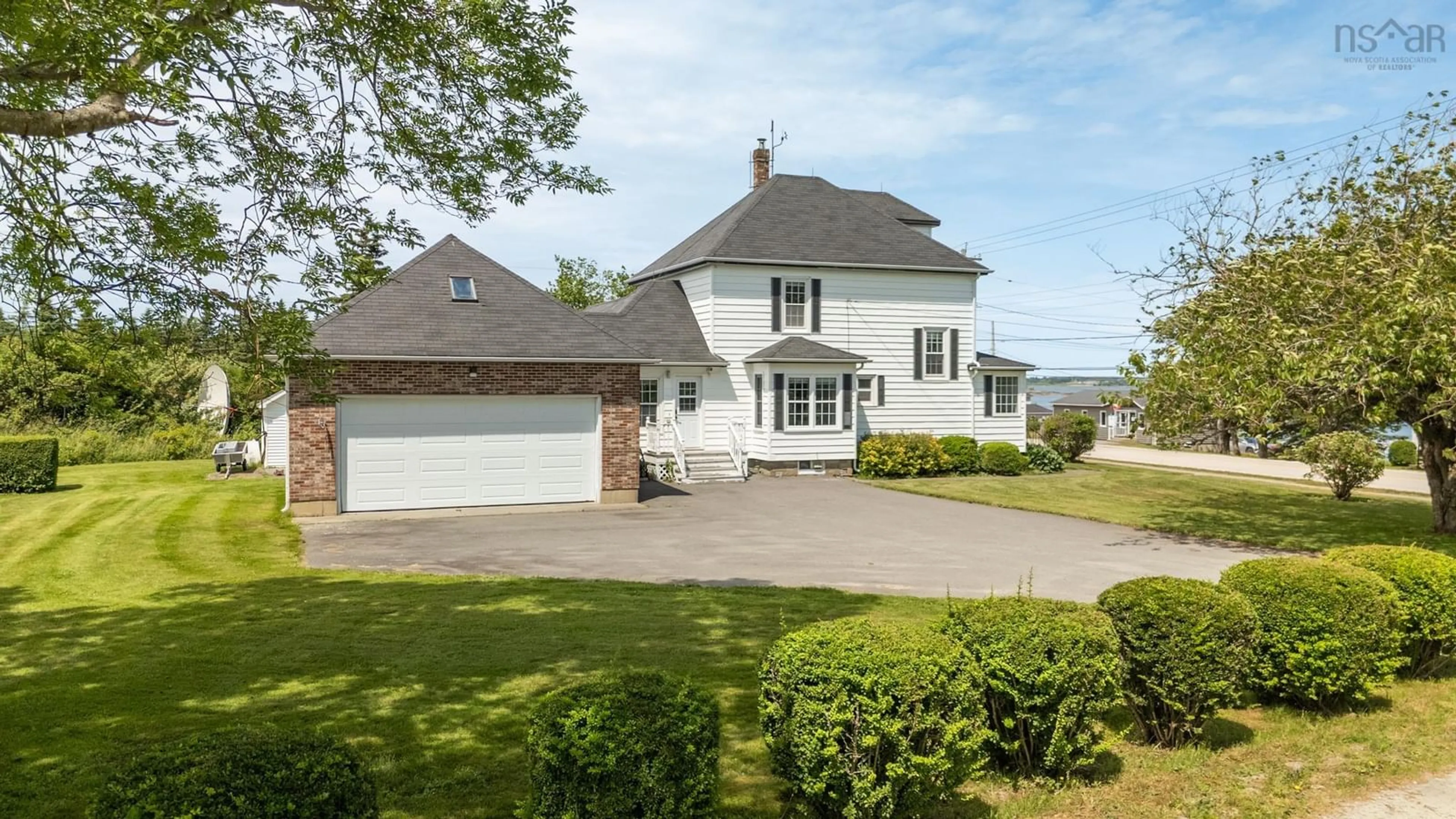 A pic from outside/outdoor area/front of a property/back of a property/a pic from drone, water/lake/river/ocean view for 1108 Highway 335, Middle West Pubnico Nova Scotia B0W 3S0