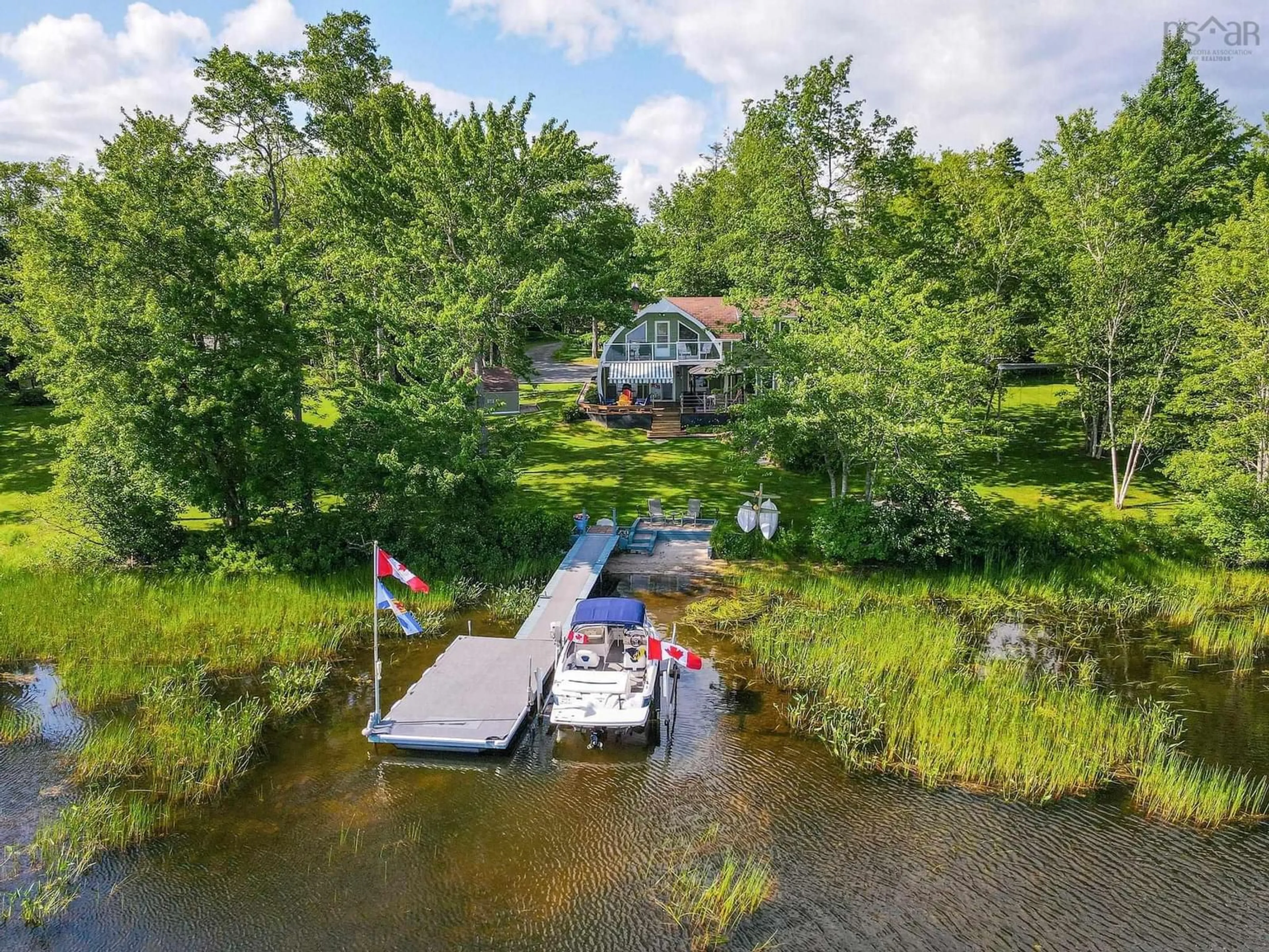 A pic from outside/outdoor area/front of a property/back of a property/a pic from drone, water/lake/river/ocean view for 183 Lakewood Dr, Shortts Lake Nova Scotia B2N 1C0