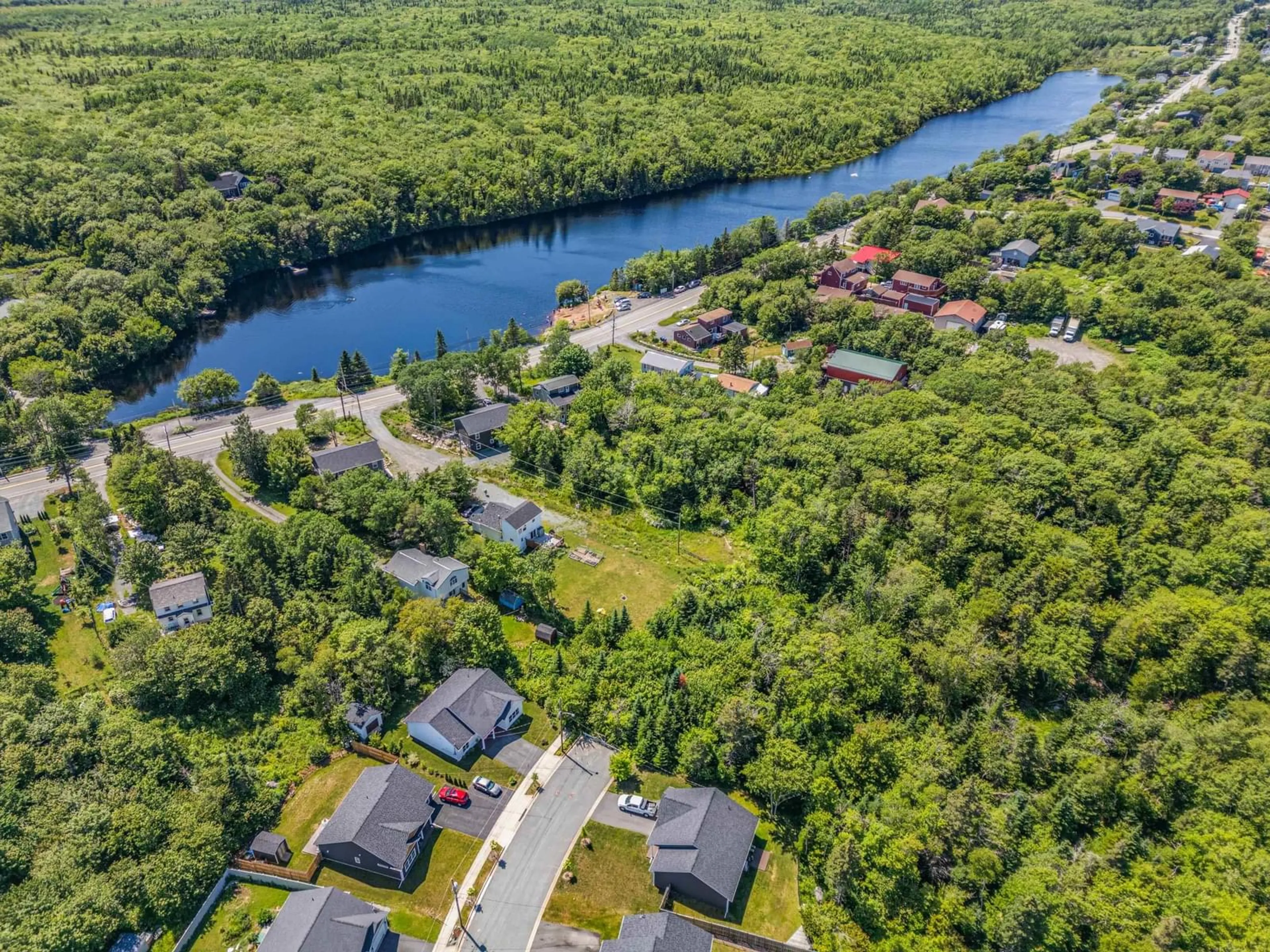 A pic from outside/outdoor area/front of a property/back of a property/a pic from drone, water/lake/river/ocean view for 25 Reginald Crt, Herring Cove Nova Scotia B3R 0C1