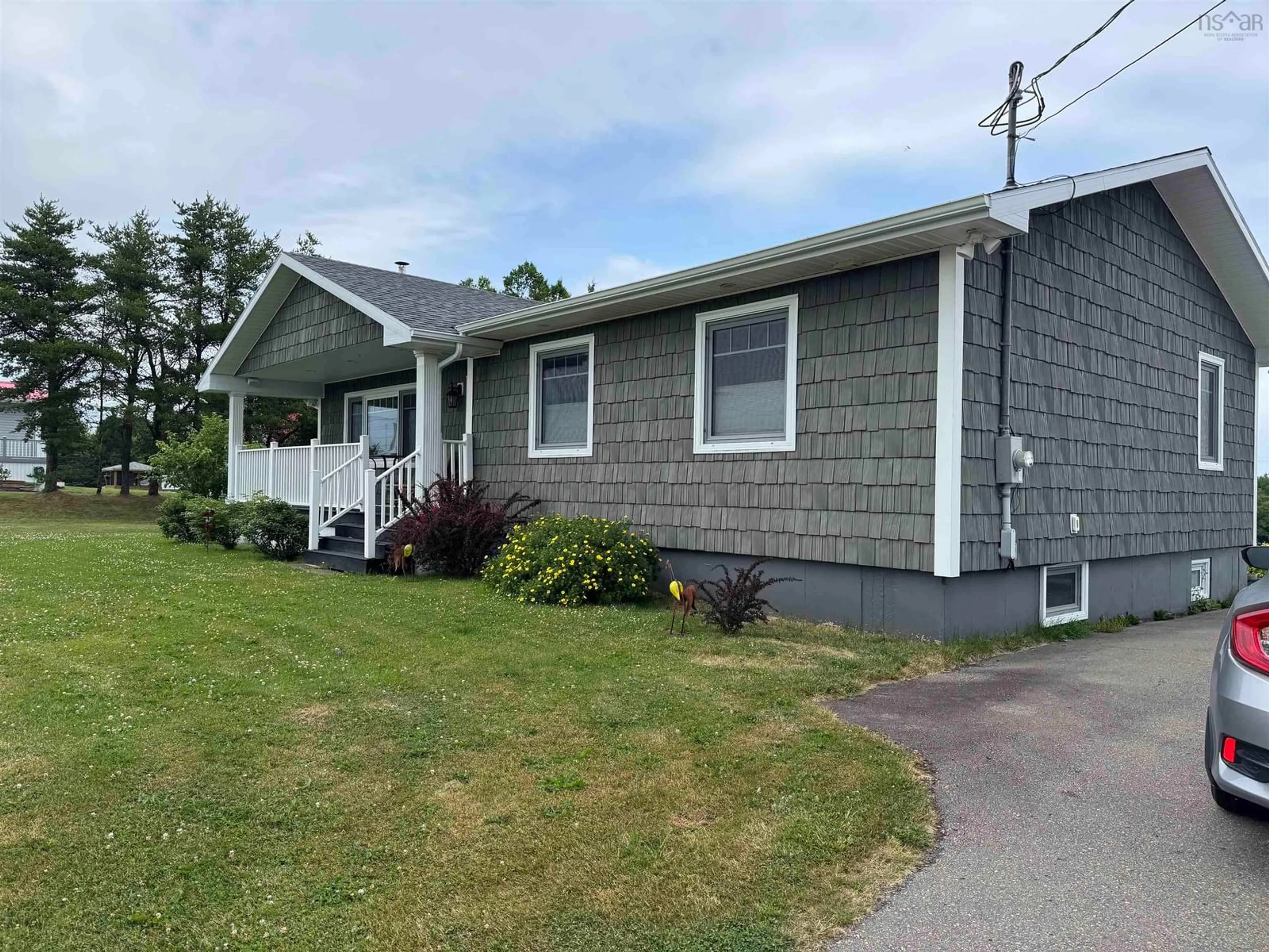 Home with vinyl exterior material, street for 186 Point Aconi, Bras D'Or Nova Scotia B1Y 1W3