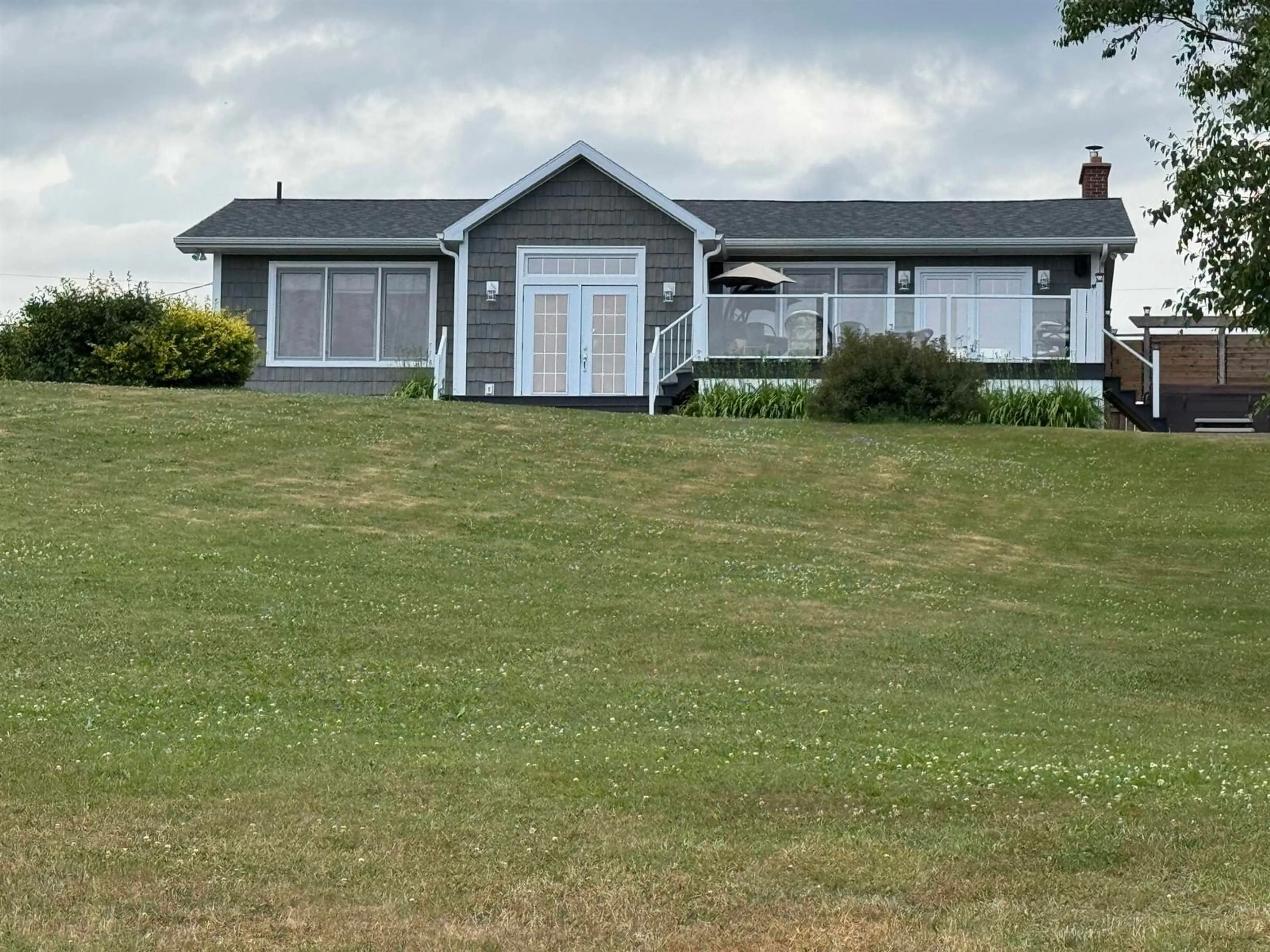 A pic from outside/outdoor area/front of a property/back of a property/a pic from drone, unknown for 186 Point Aconi, Bras D'Or Nova Scotia B1Y 1W3