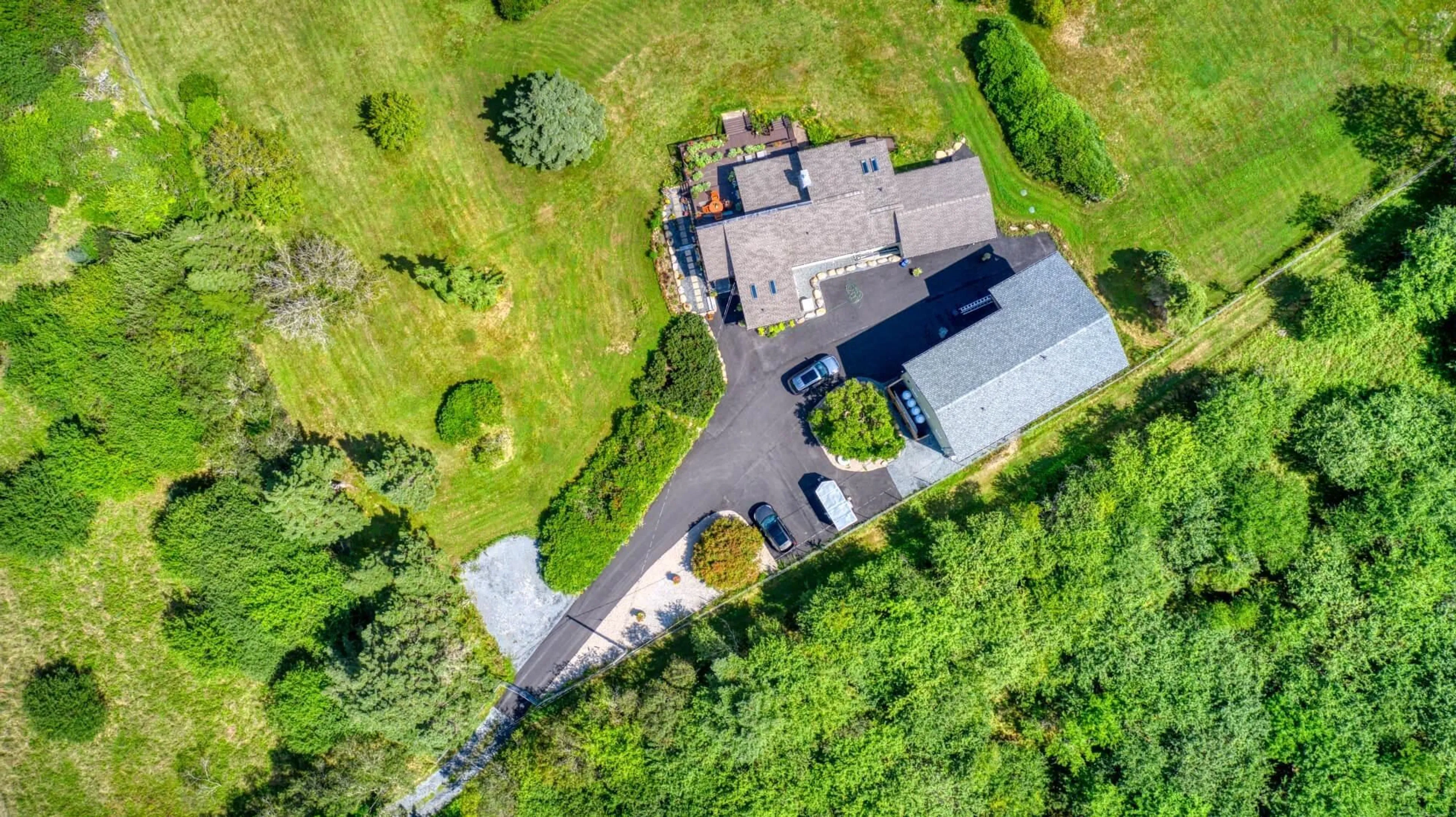 A pic from outside/outdoor area/front of a property/back of a property/a pic from drone, street for 177 Corkums Island Rd, Corkums Island Nova Scotia B0J 2C0