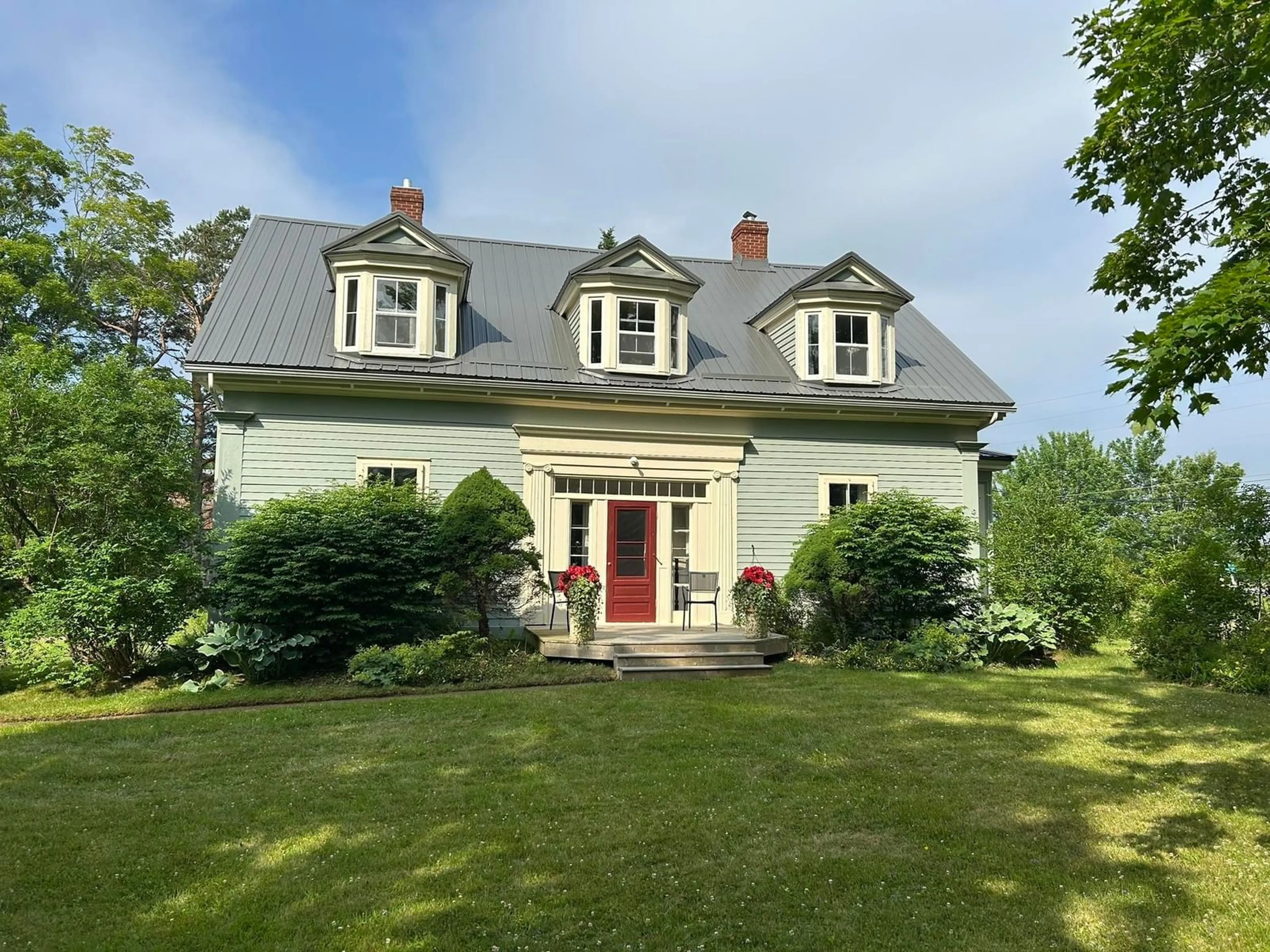 Home with vinyl exterior material, street for 8480 Highway 2, Great Village Nova Scotia B0M 1L0